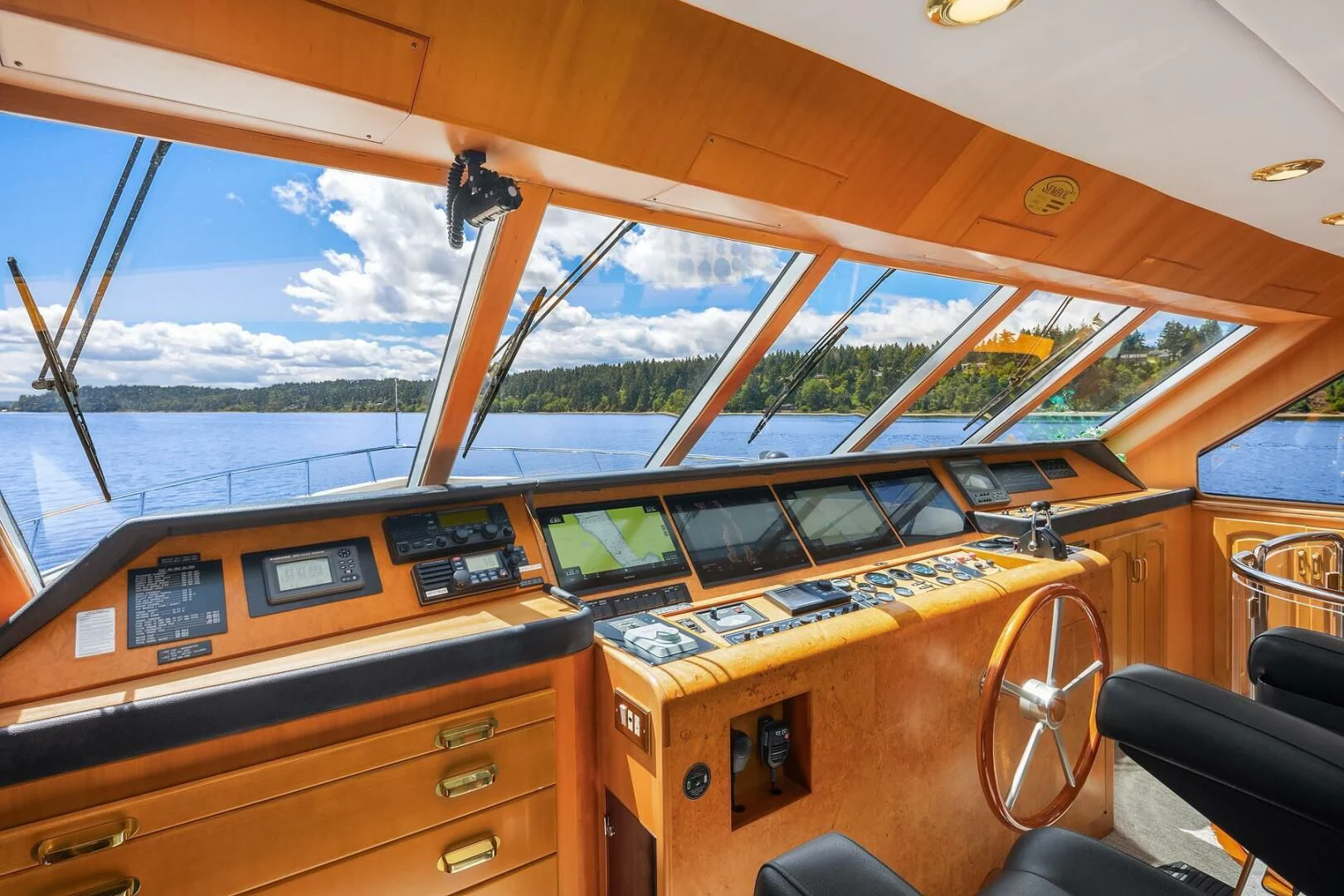 inside of a vehicle with a large window and a view of the mountains aboard QUE SA-RAH SA-RAH Yacht for Sale