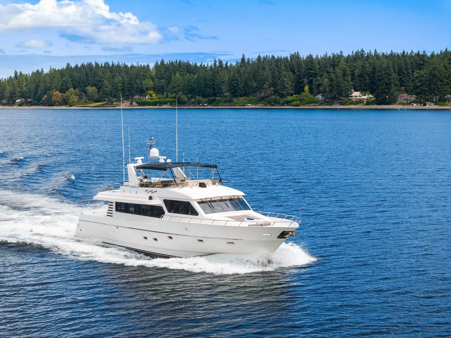 a boat on the water aboard QUE SA-RAH SA-RAH Yacht for Sale
