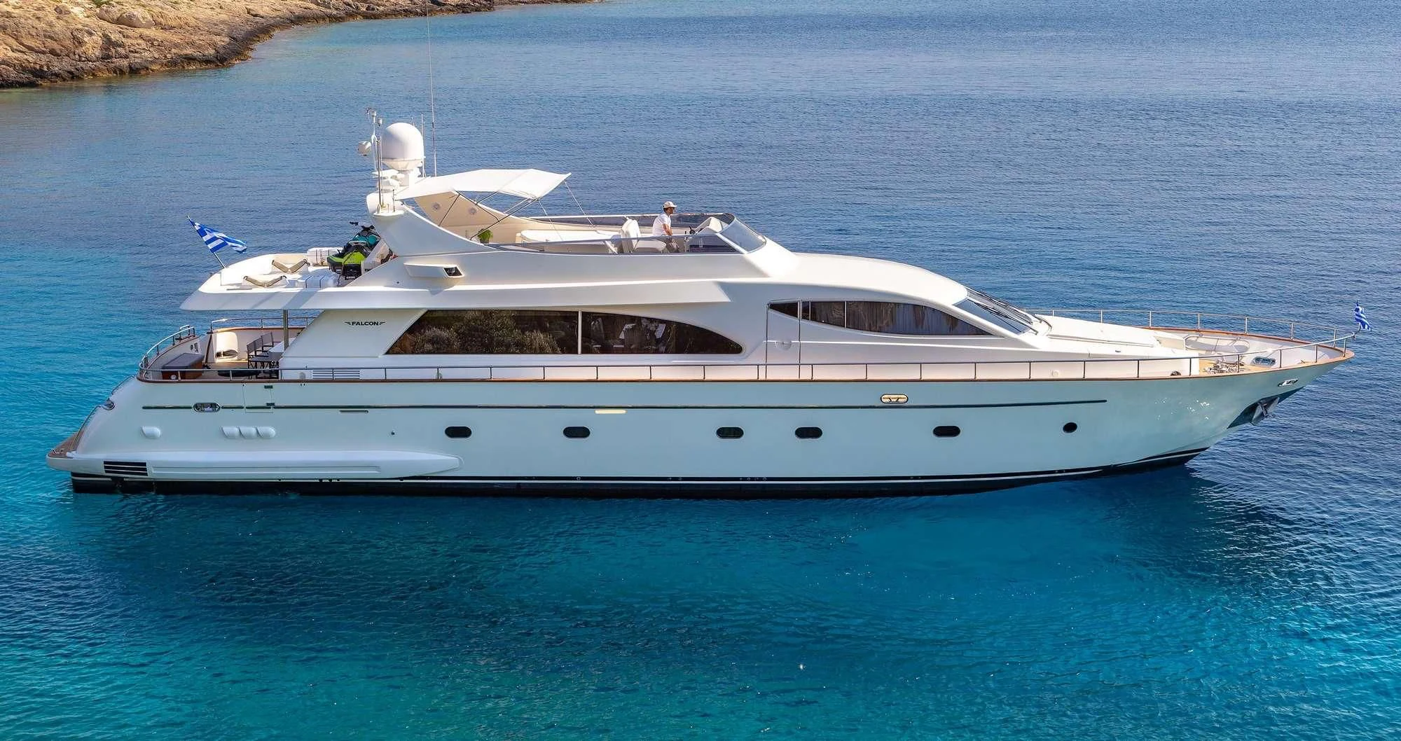 a white yacht in the water aboard EFMARIA Yacht for Sale