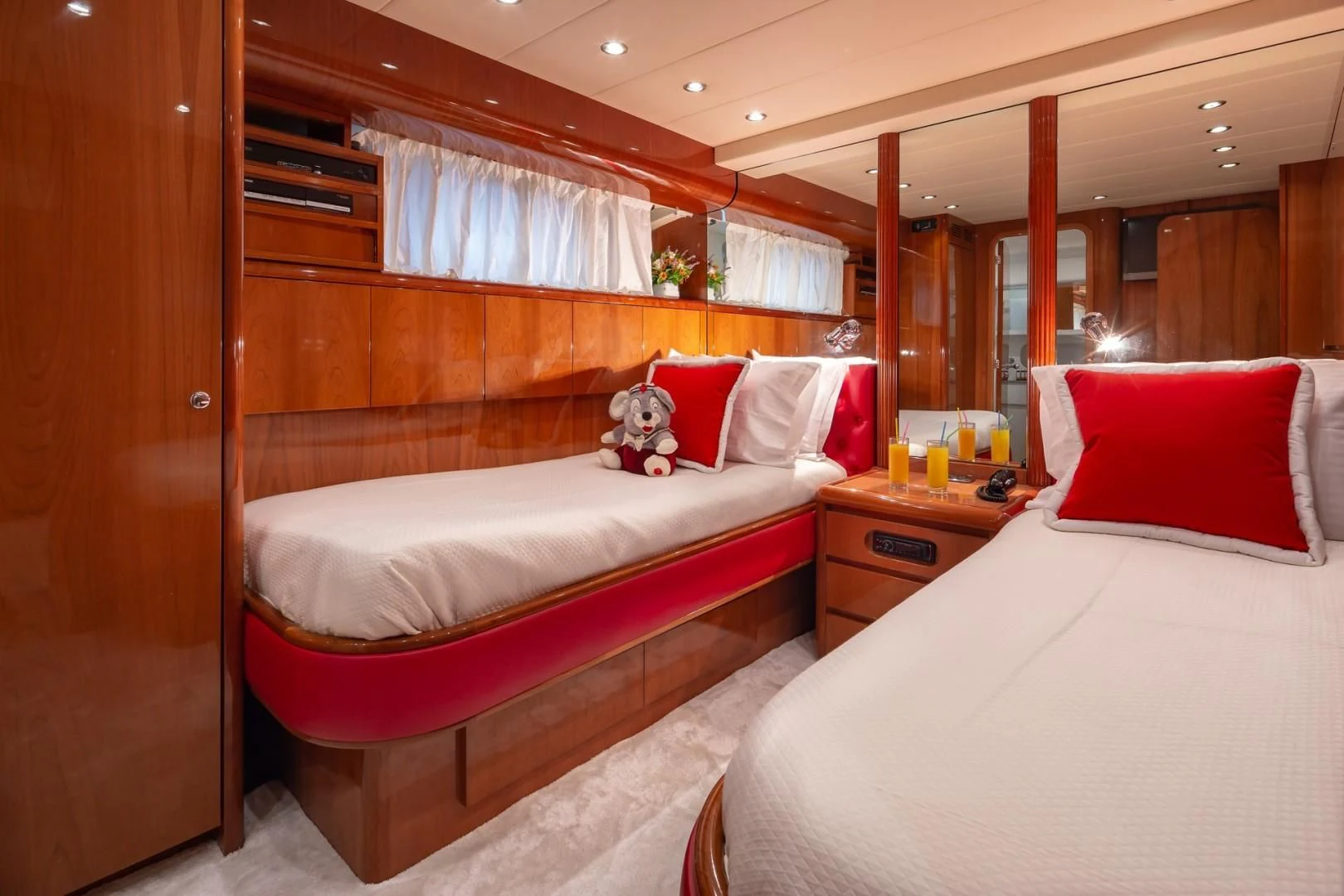 a room with two beds aboard EFMARIA Yacht for Sale