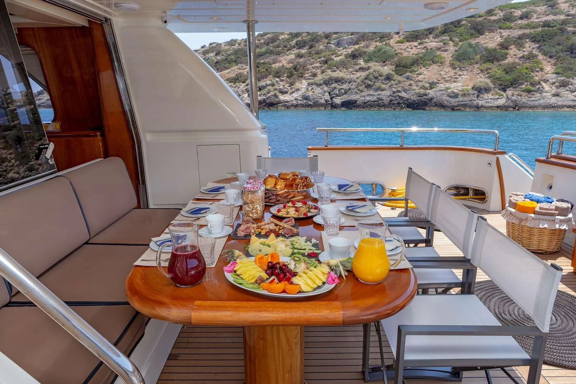 a table with food on it aboard EFMARIA Yacht for Sale