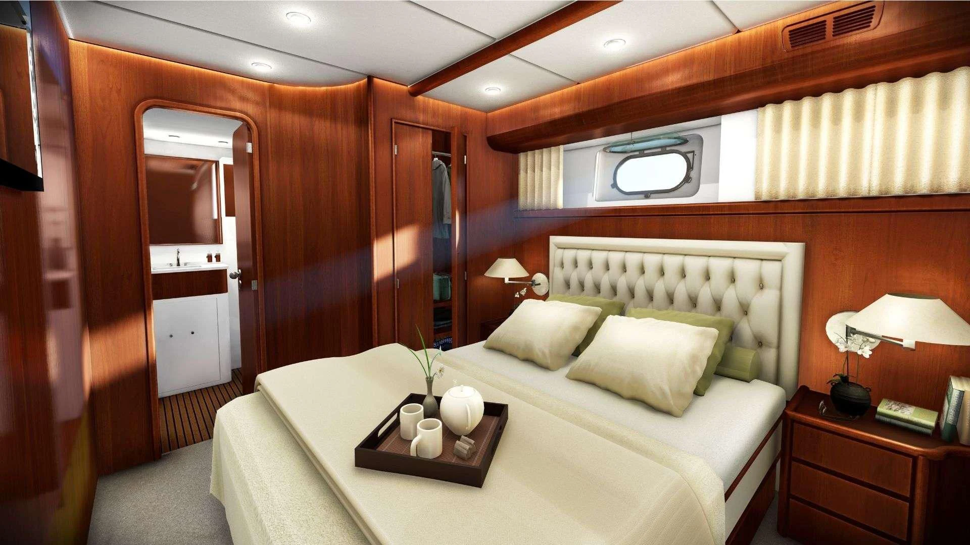 a bed in a room aboard EFMARIA Yacht for Sale