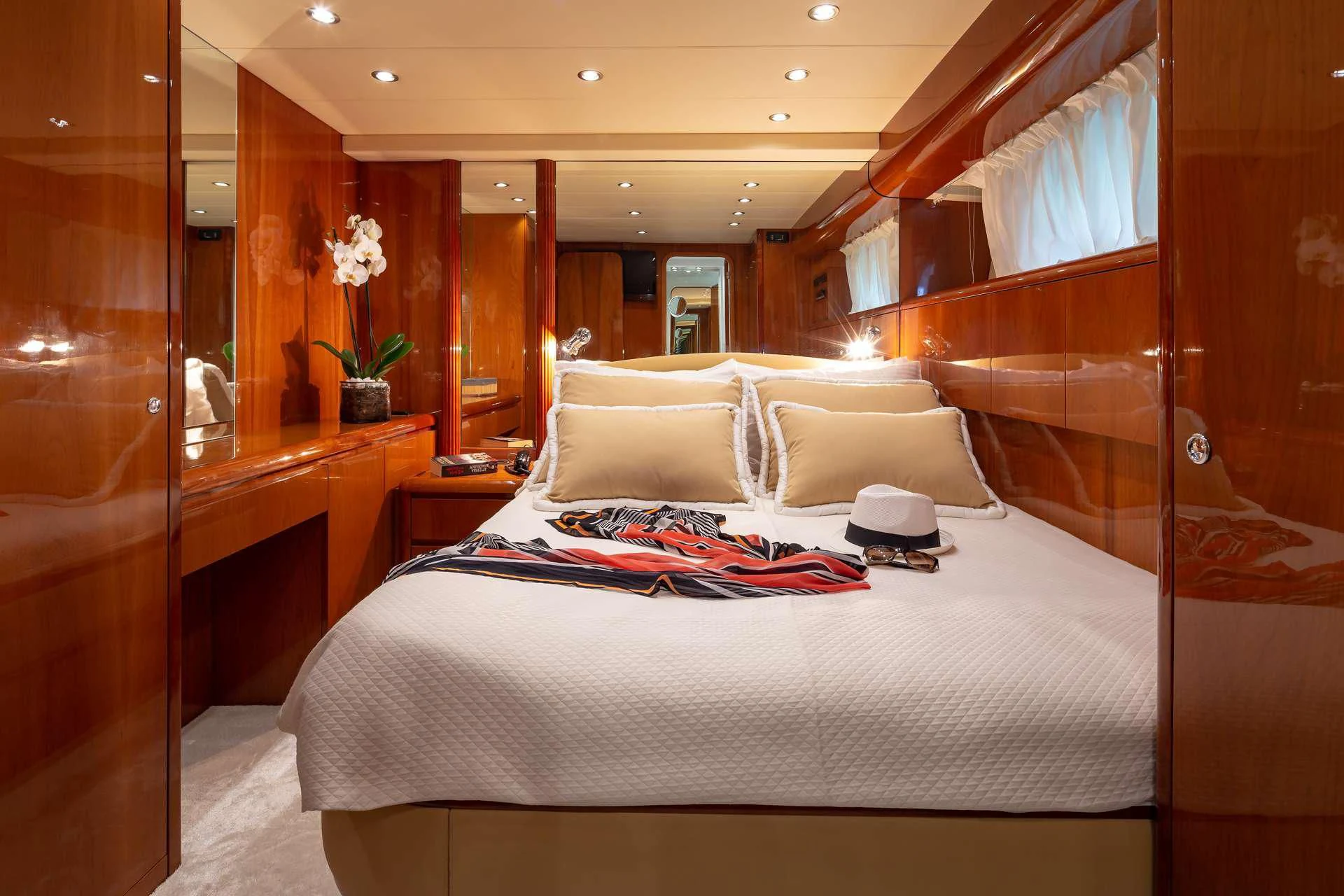 a bed in a room aboard EFMARIA Yacht for Sale