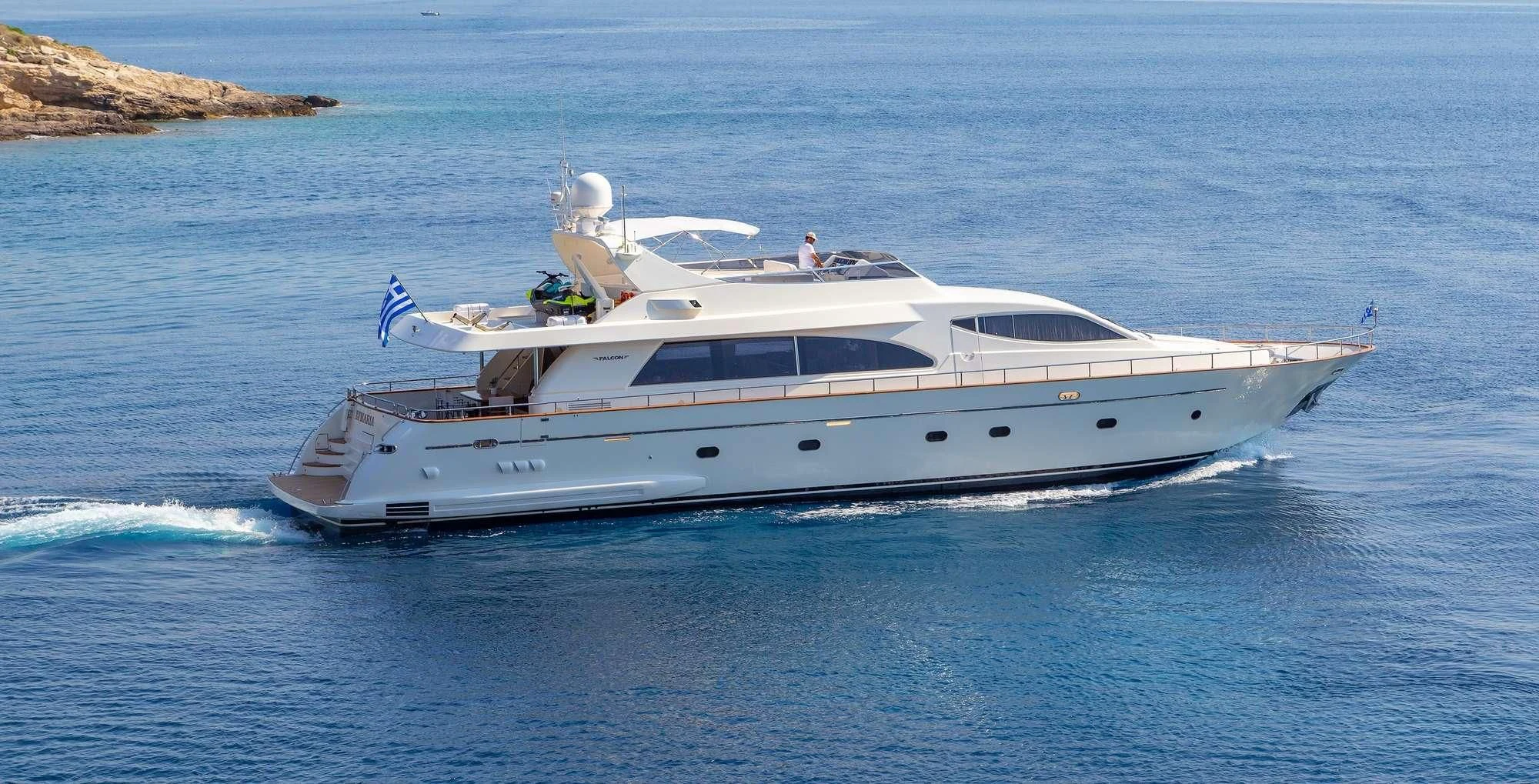 a white yacht in the water aboard EFMARIA Yacht for Sale