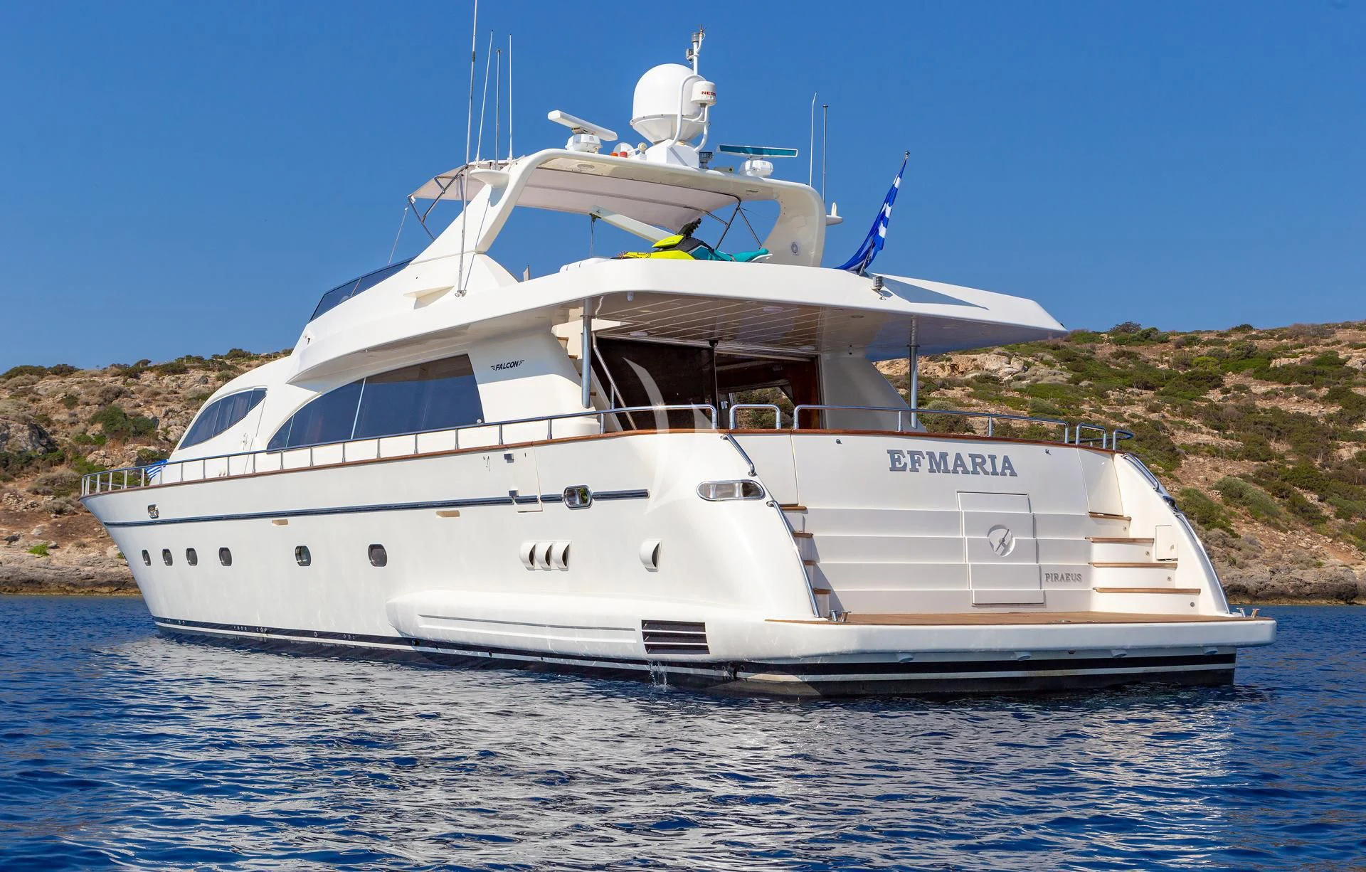 a white yacht on the water aboard EFMARIA Yacht for Sale