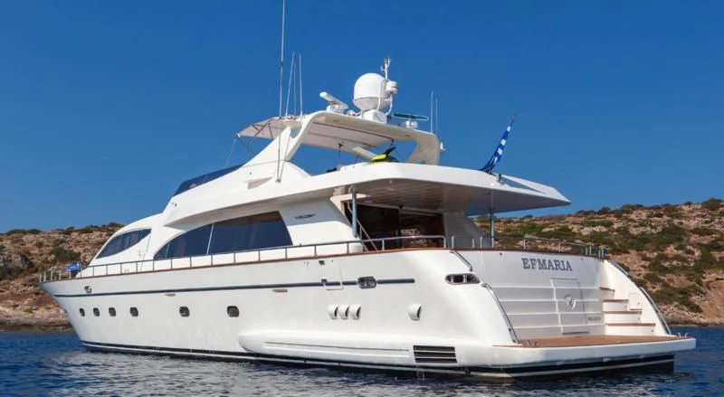 a white yacht on the water aboard EFMARIA Yacht for Sale