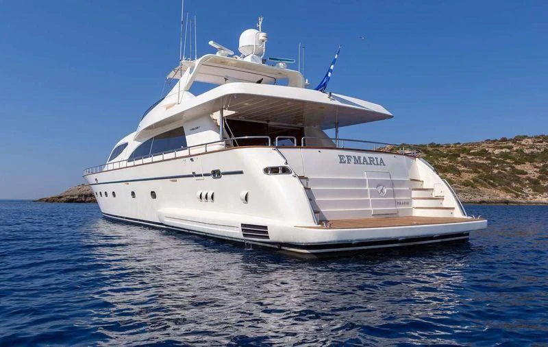 a white yacht on the water aboard EFMARIA Yacht for Sale