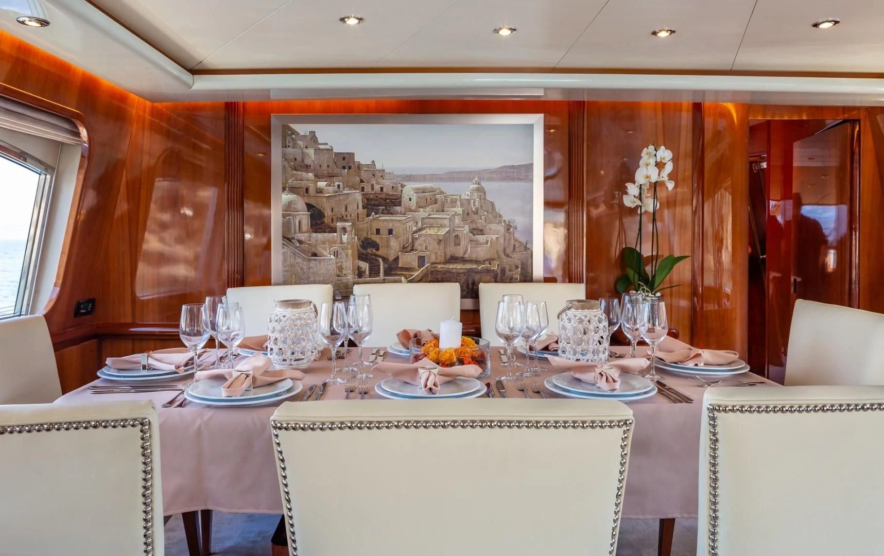 a table set for a dinner aboard EFMARIA Yacht for Sale