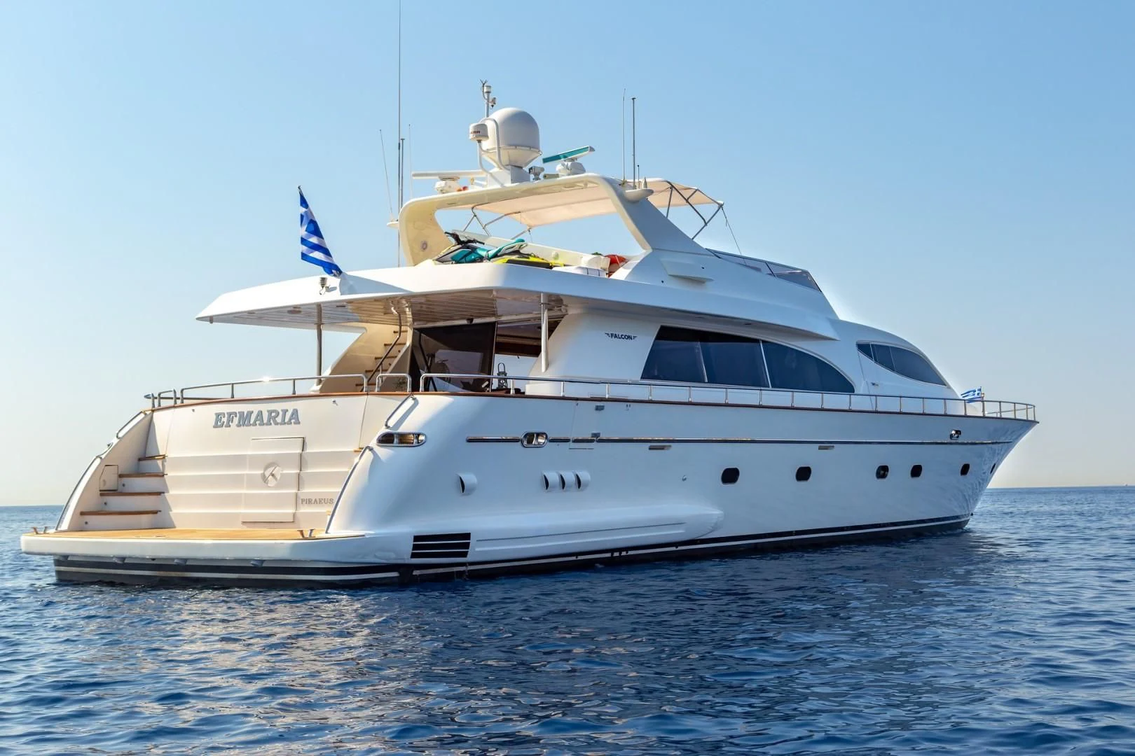 a white yacht on the water aboard EFMARIA Yacht for Sale
