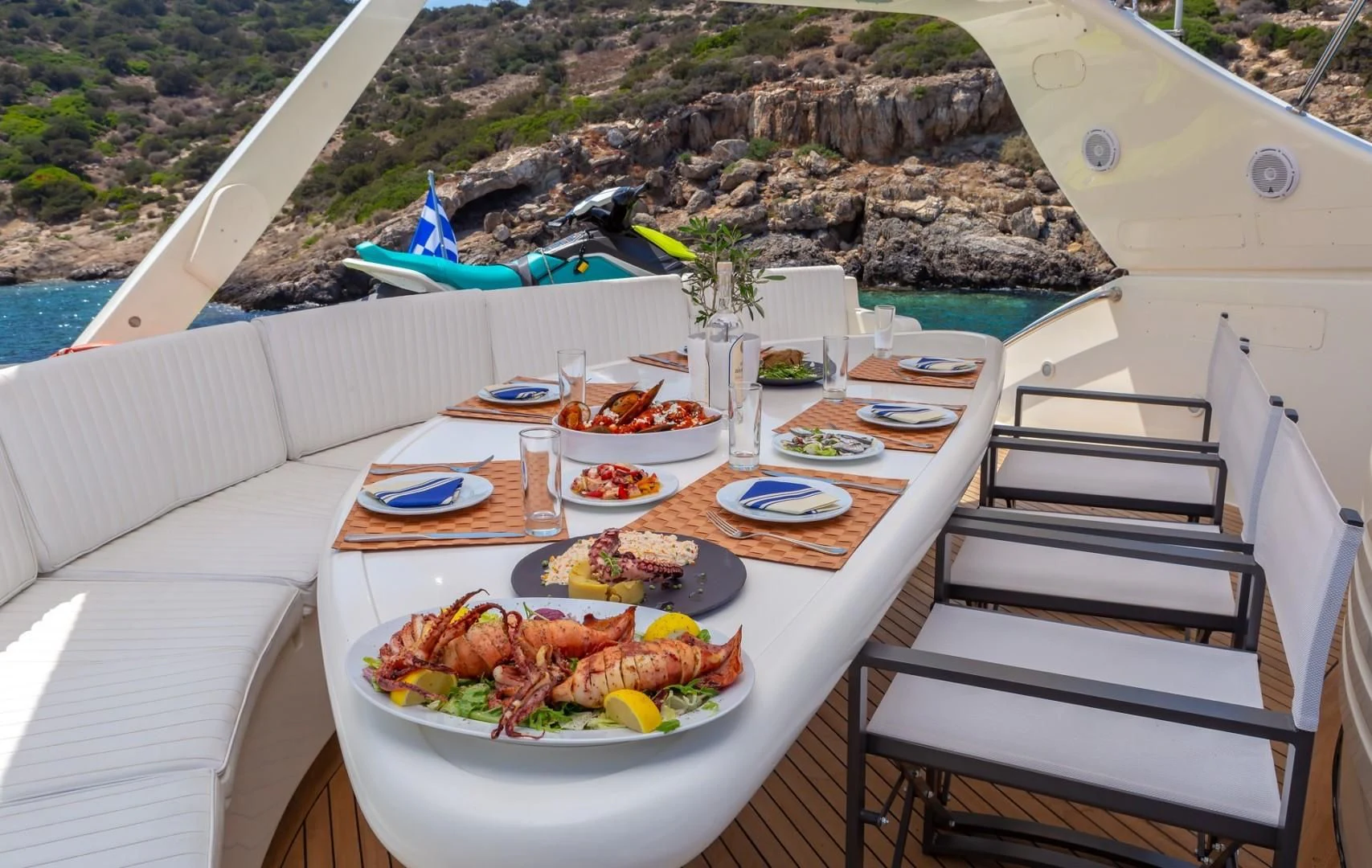 a table with food on it aboard EFMARIA Yacht for Sale