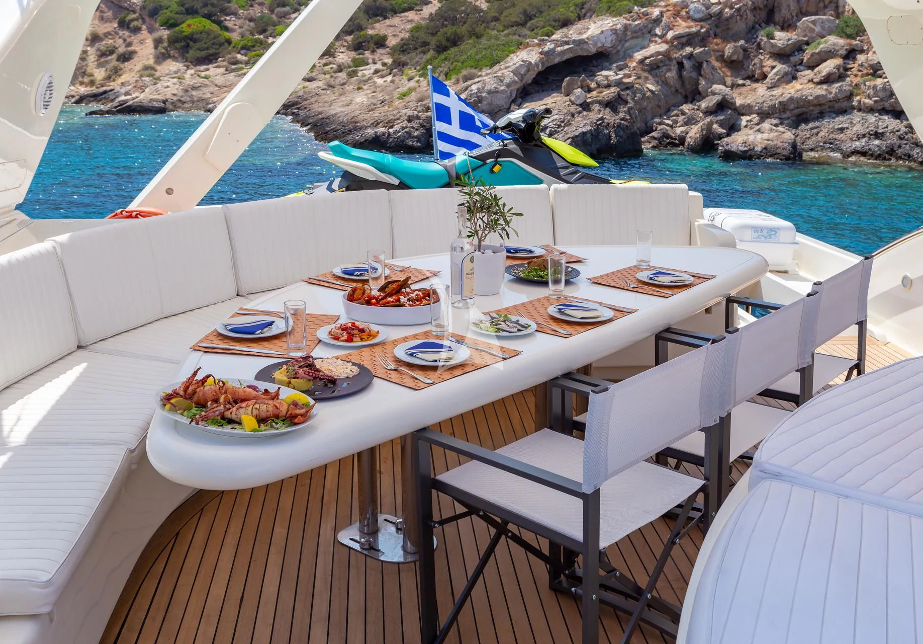 a table with food on it aboard EFMARIA Yacht for Sale