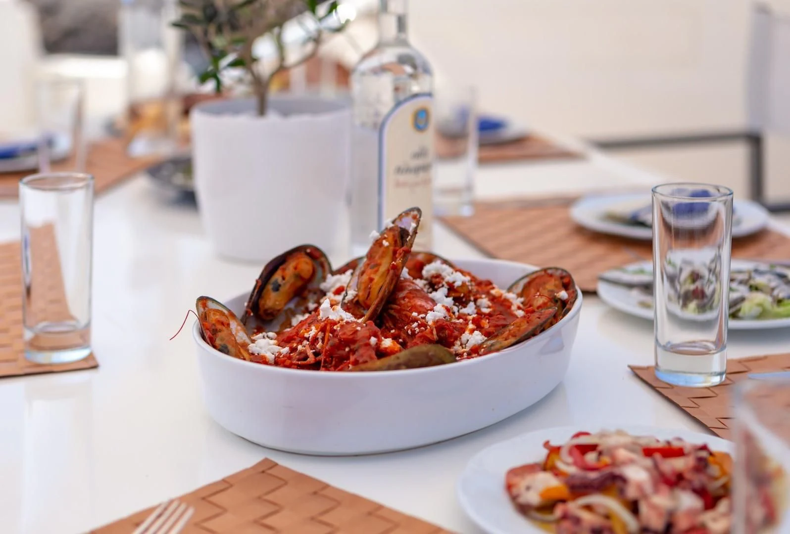a bowl of food on a table aboard EFMARIA Yacht for Sale