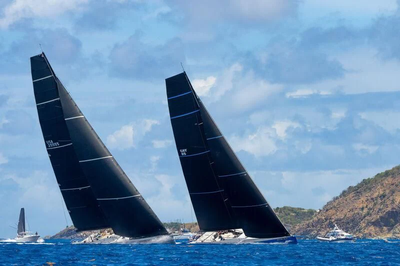 a large black ship on a beach aboard DEEP BLUE Yacht for Sale