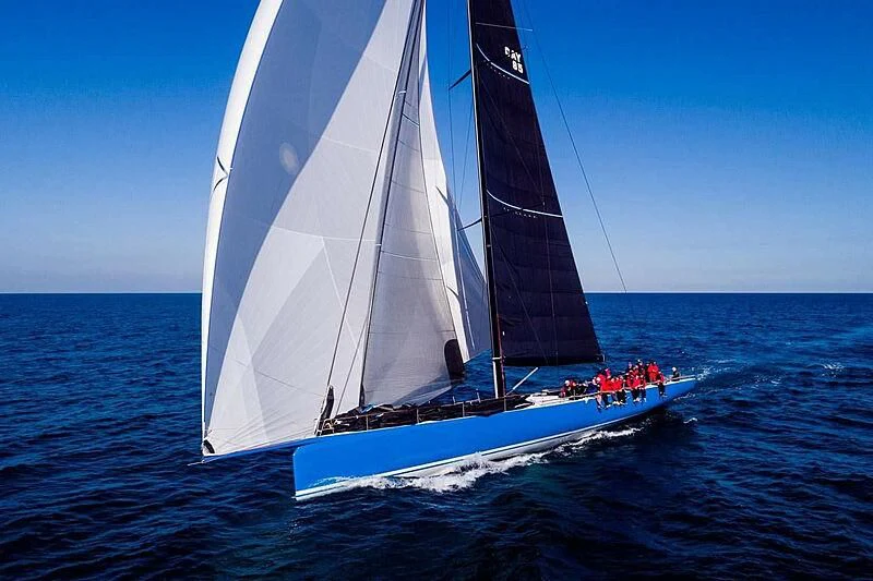 a group of people sailing on a sailboat aboard DEEP BLUE Yacht for Sale