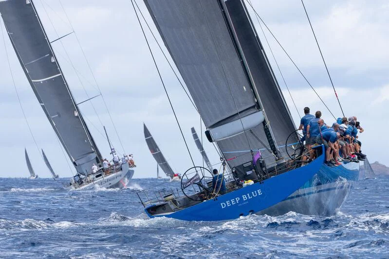 a group of people on a sailboat aboard DEEP BLUE Yacht for Sale