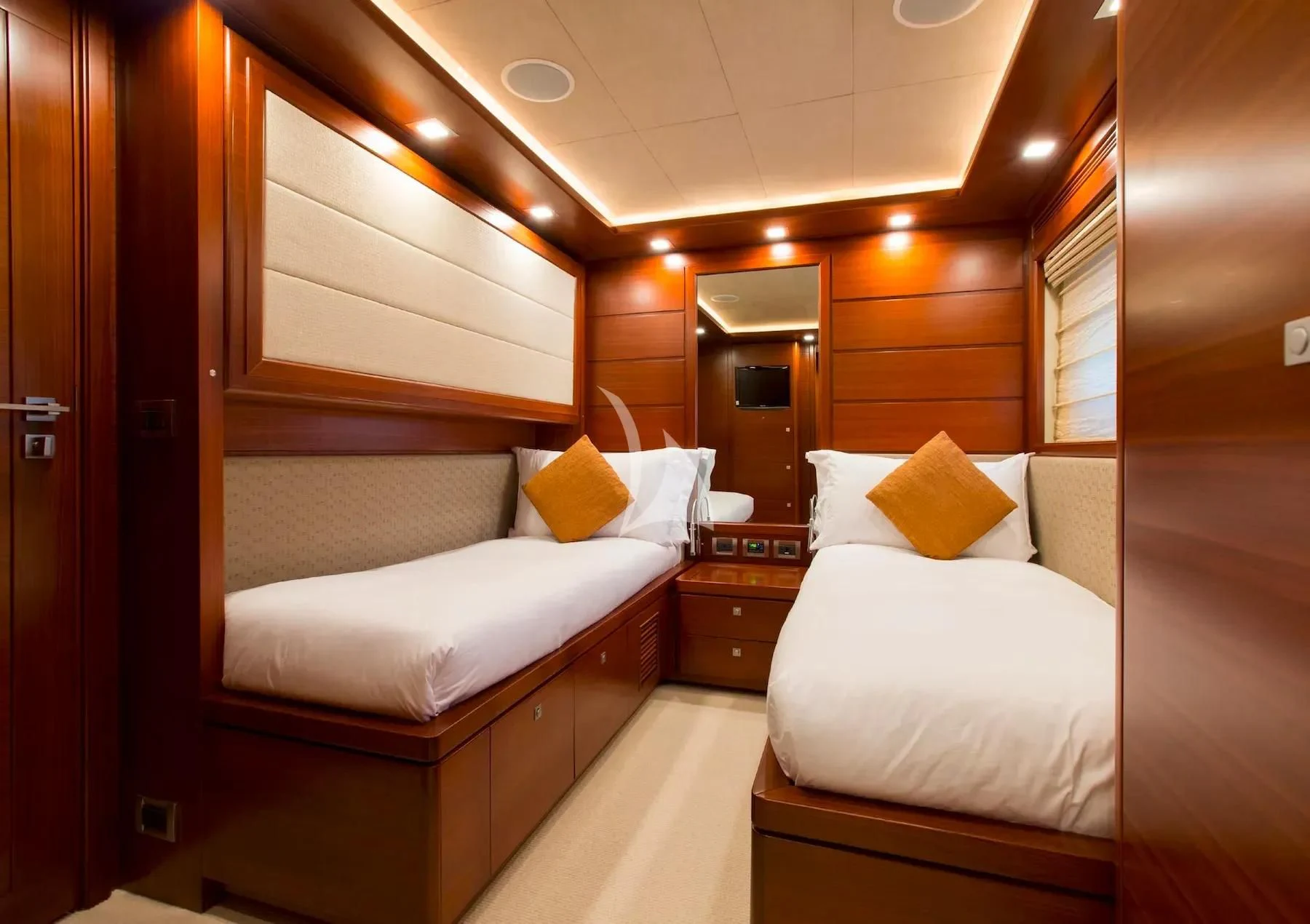 a room with a couple of beds aboard ROBUSTO Yacht for Sale