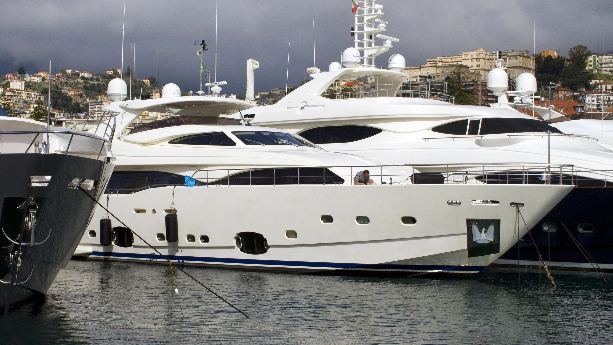 a couple of boats in a harbor aboard ROBUSTO Yacht for Sale