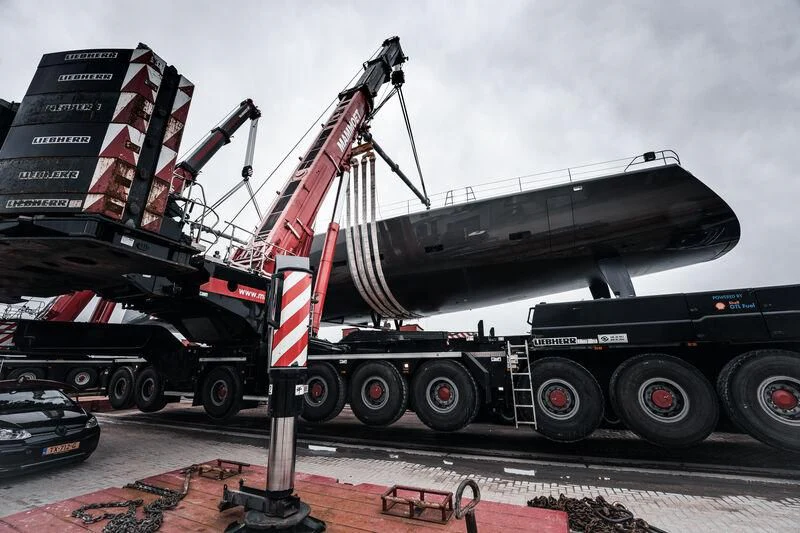 a large military vehicle with a large gun on top aboard ALEA Yacht for Sale