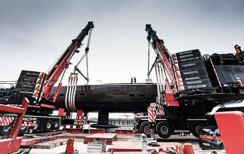 a large black machine with red wheels aboard ALEA Yacht for Sale