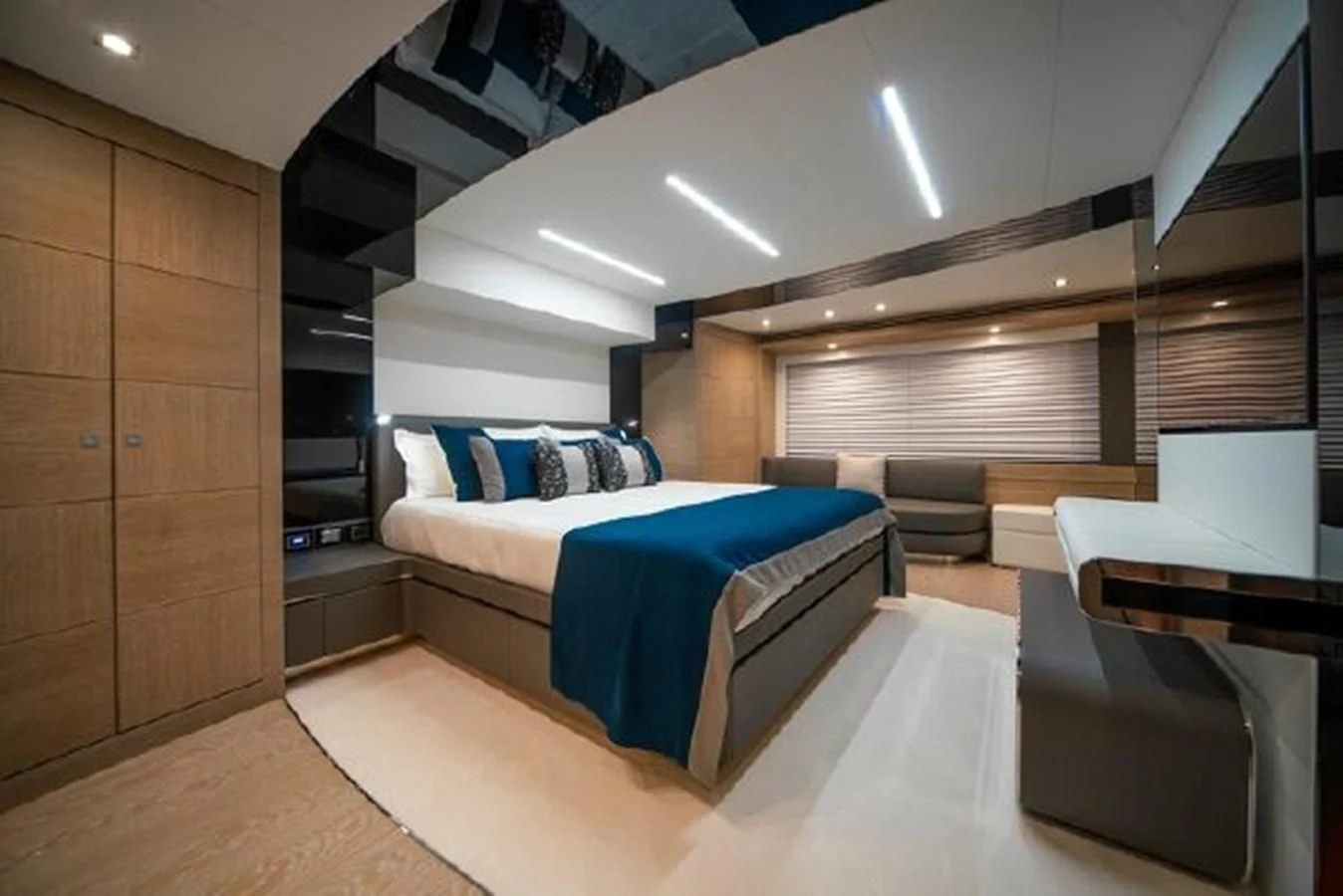 a room with a bed and a desk aboard 2021 ASTONDOA 100 CENTURY Yacht for Sale