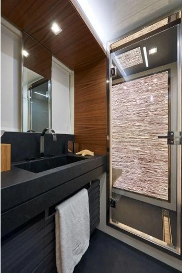 a bathroom with a sink and a mirror aboard 2021 ASTONDOA 100 CENTURY Yacht for Sale