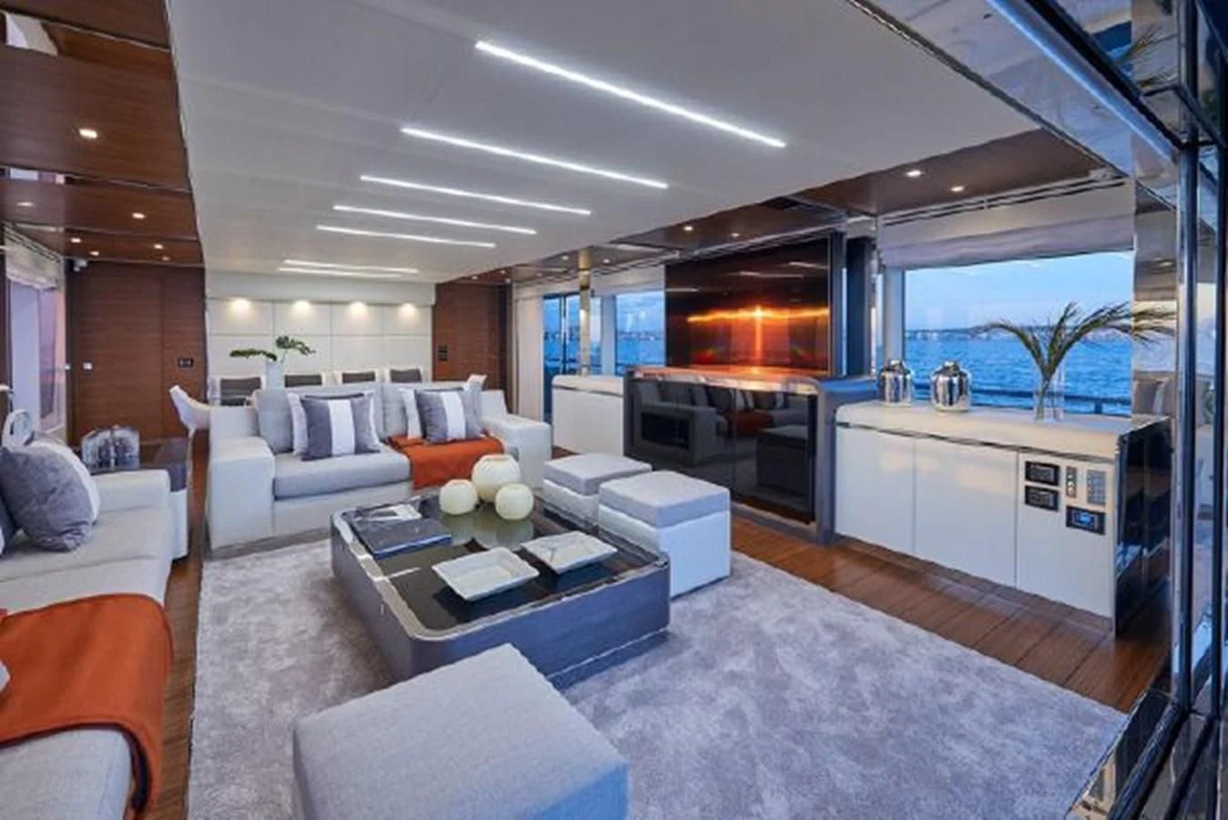a modern living room with a large open window aboard 2021 ASTONDOA 100 CENTURY Yacht for Sale