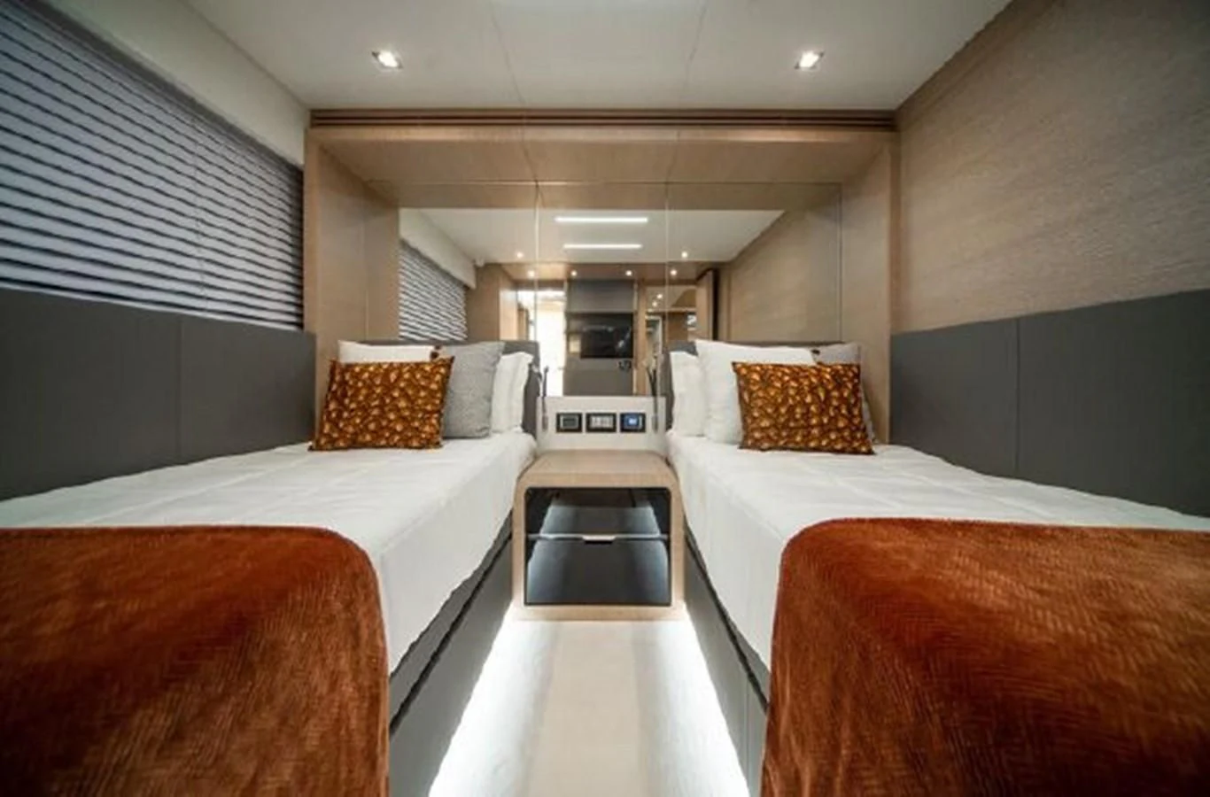 a room with beds and a mirror aboard 2021 ASTONDOA 100 CENTURY Yacht for Sale
