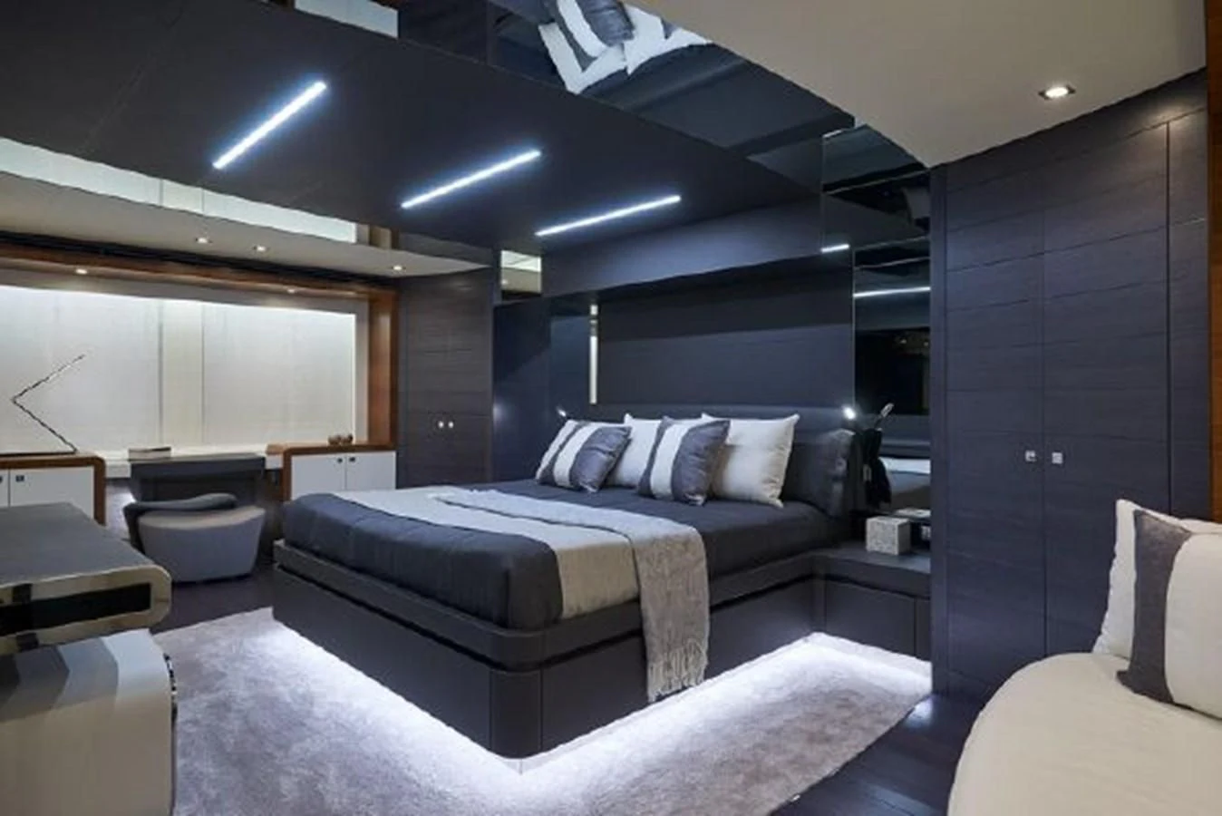 a room with a bed and a couch aboard 2021 ASTONDOA 100 CENTURY Yacht for Sale