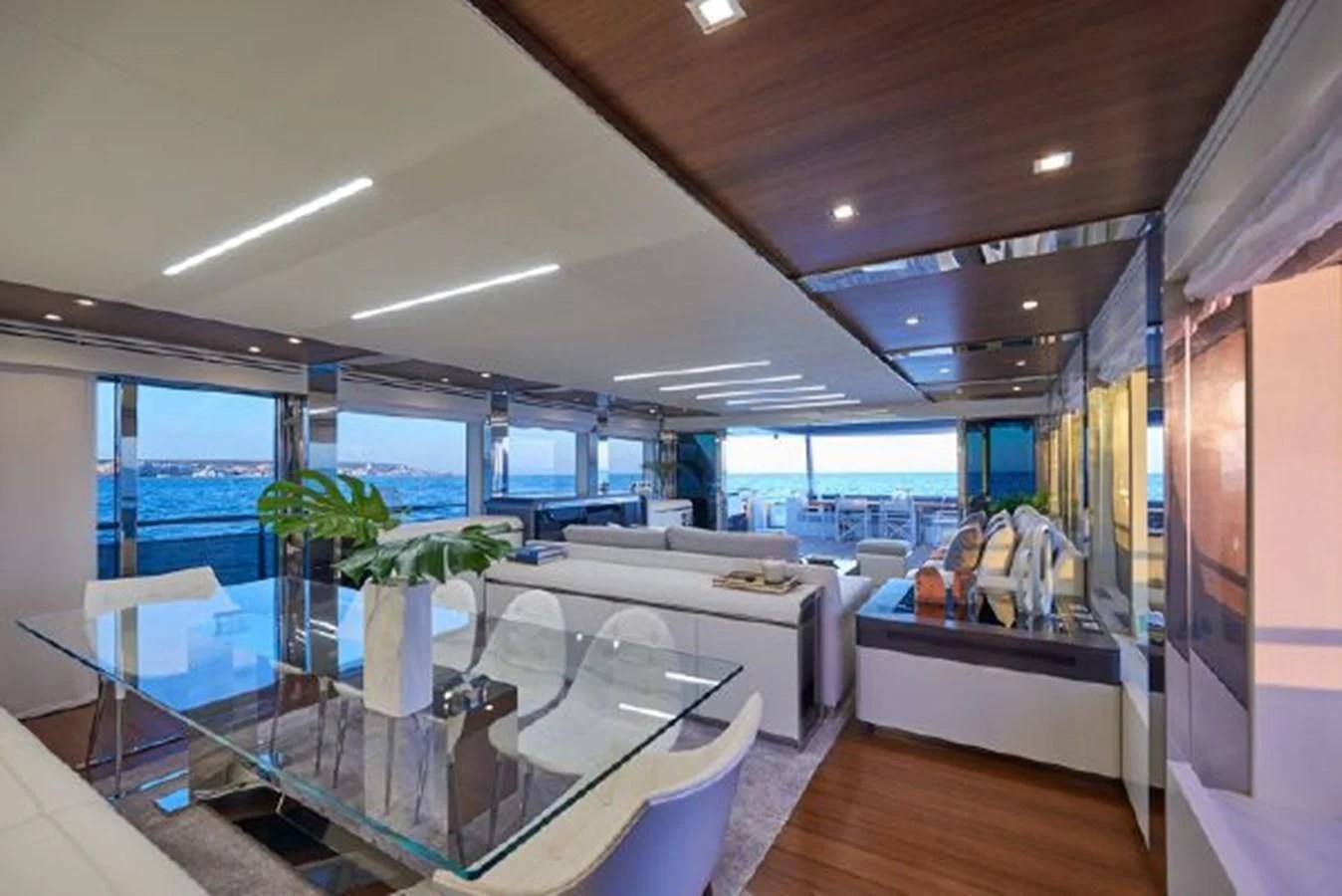 a room with a table and chairs aboard 2021 ASTONDOA 100 CENTURY Yacht for Sale