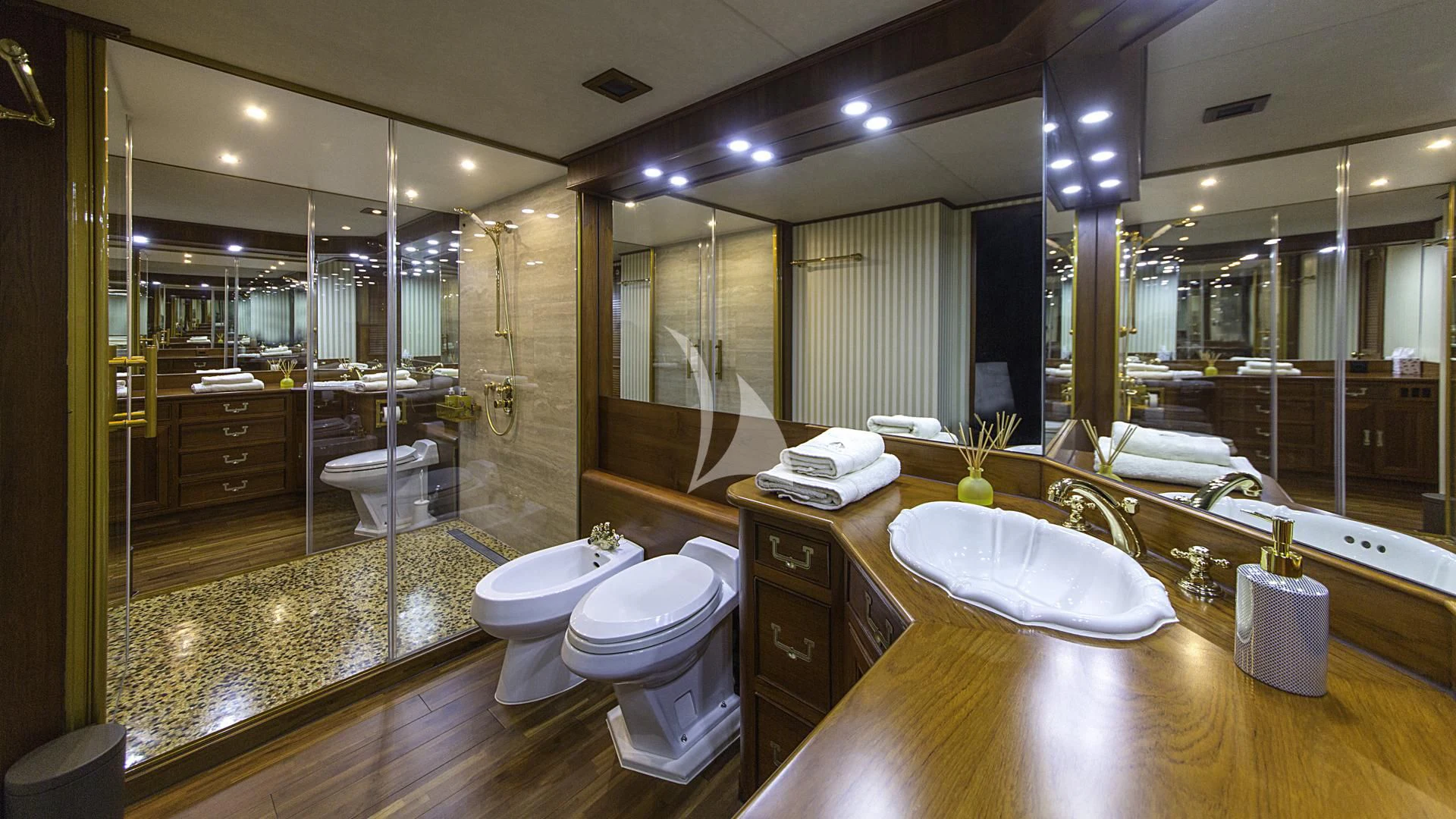 a bathroom with a large mirror aboard AURIANE Yacht for Sale