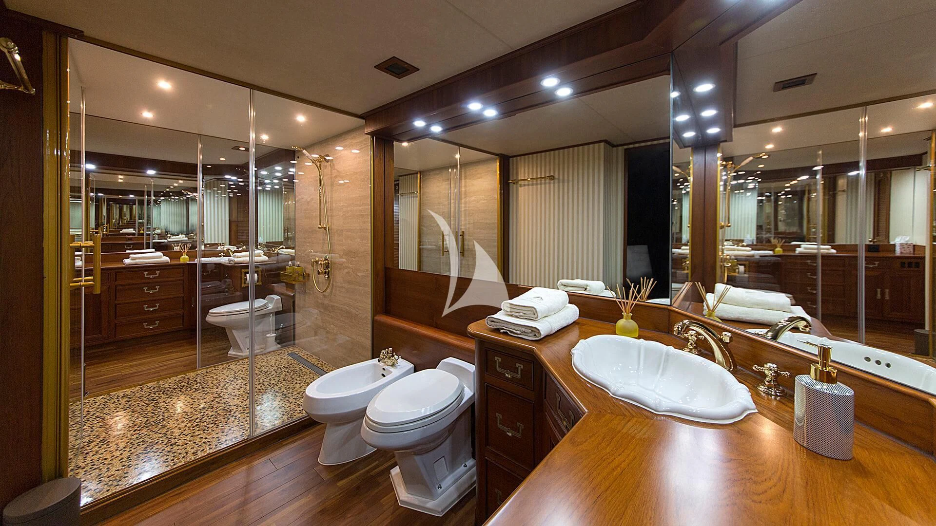 a bathroom with a large mirror aboard AURIANE Yacht for Sale