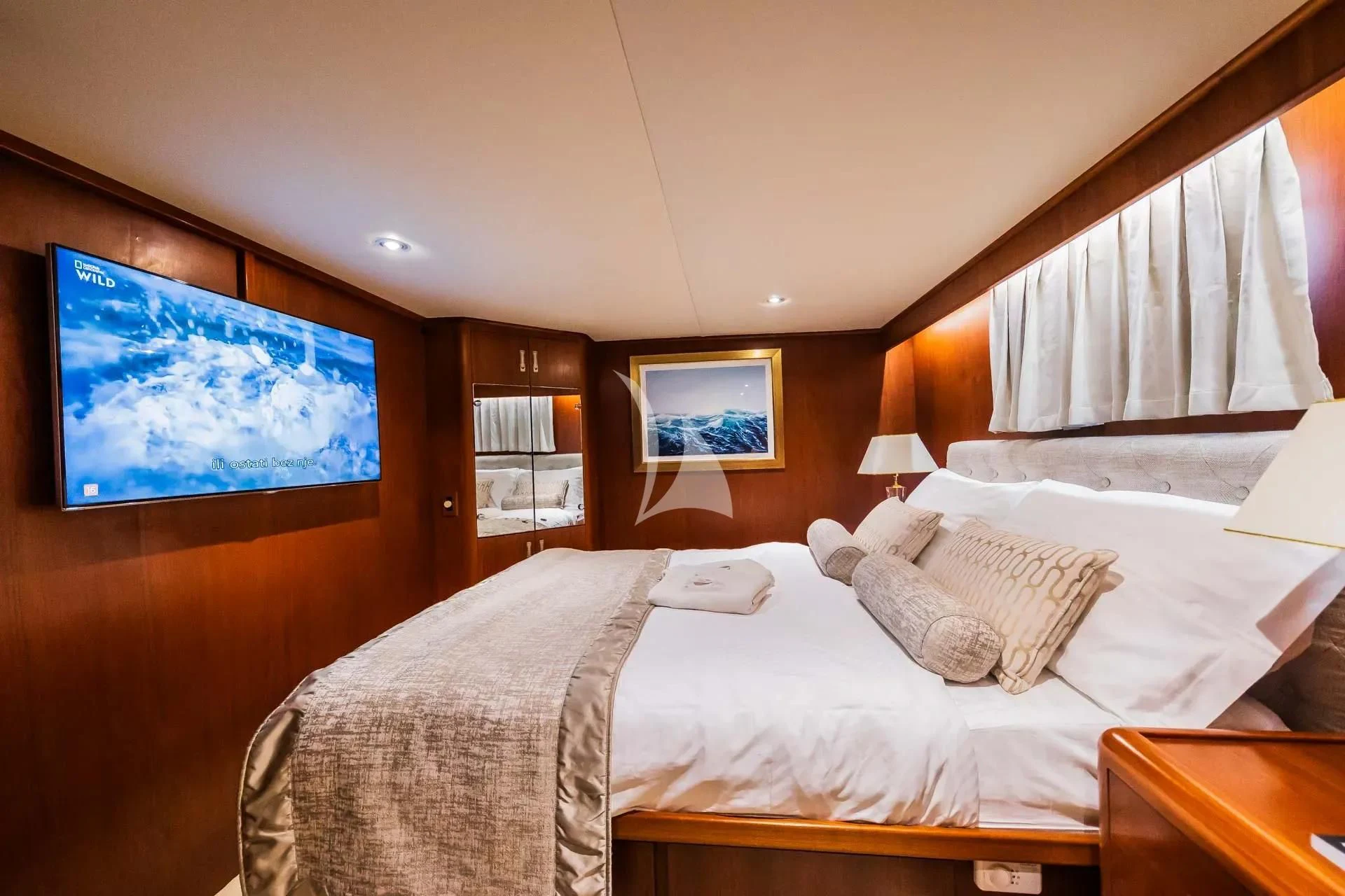 a hotel room with two beds aboard AURIANE Yacht for Sale