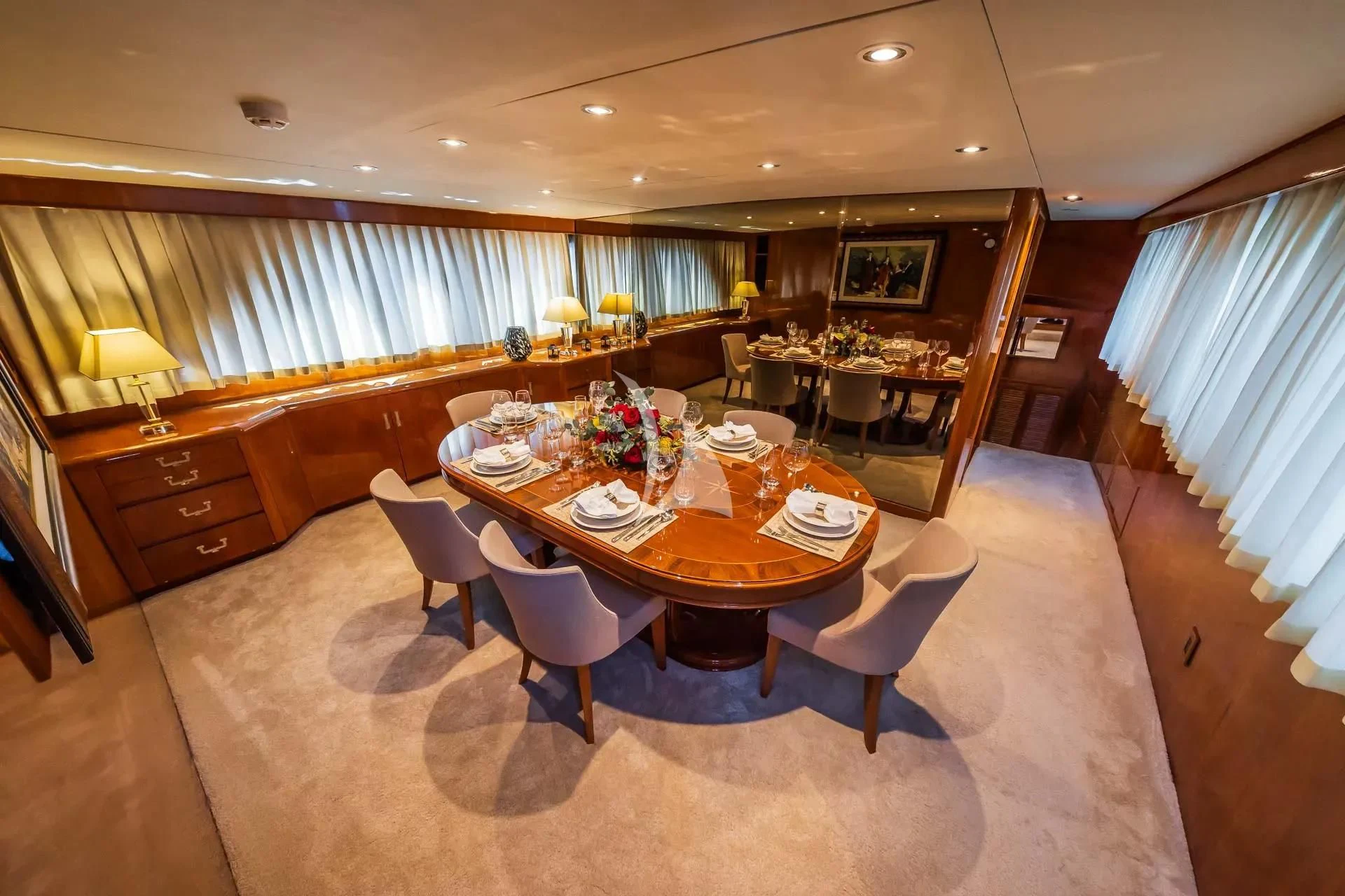 a dining room with a table and chairs aboard AURIANE Yacht for Sale