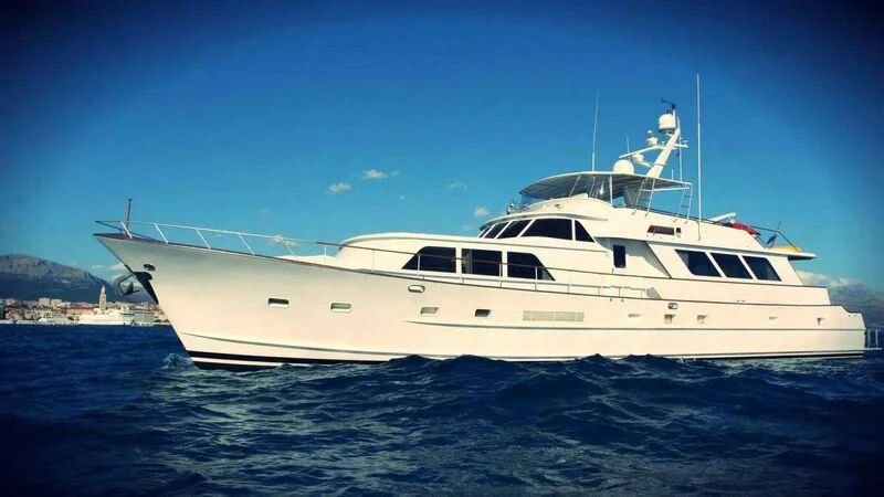 a white yacht in the water aboard AURIANE Yacht for Sale