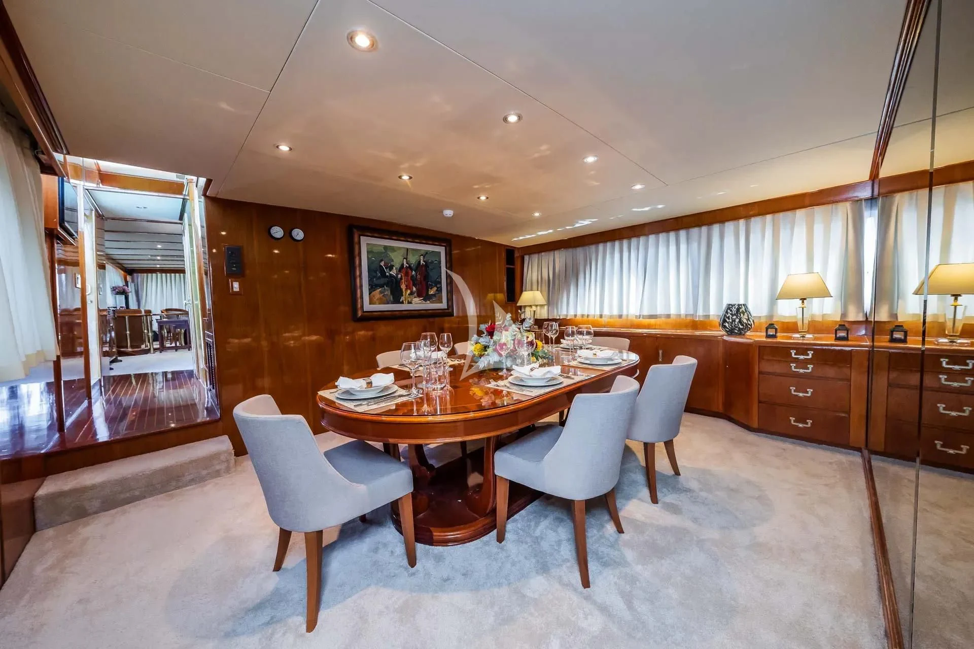 a dining room with a table and chairs aboard AURIANE Yacht for Sale