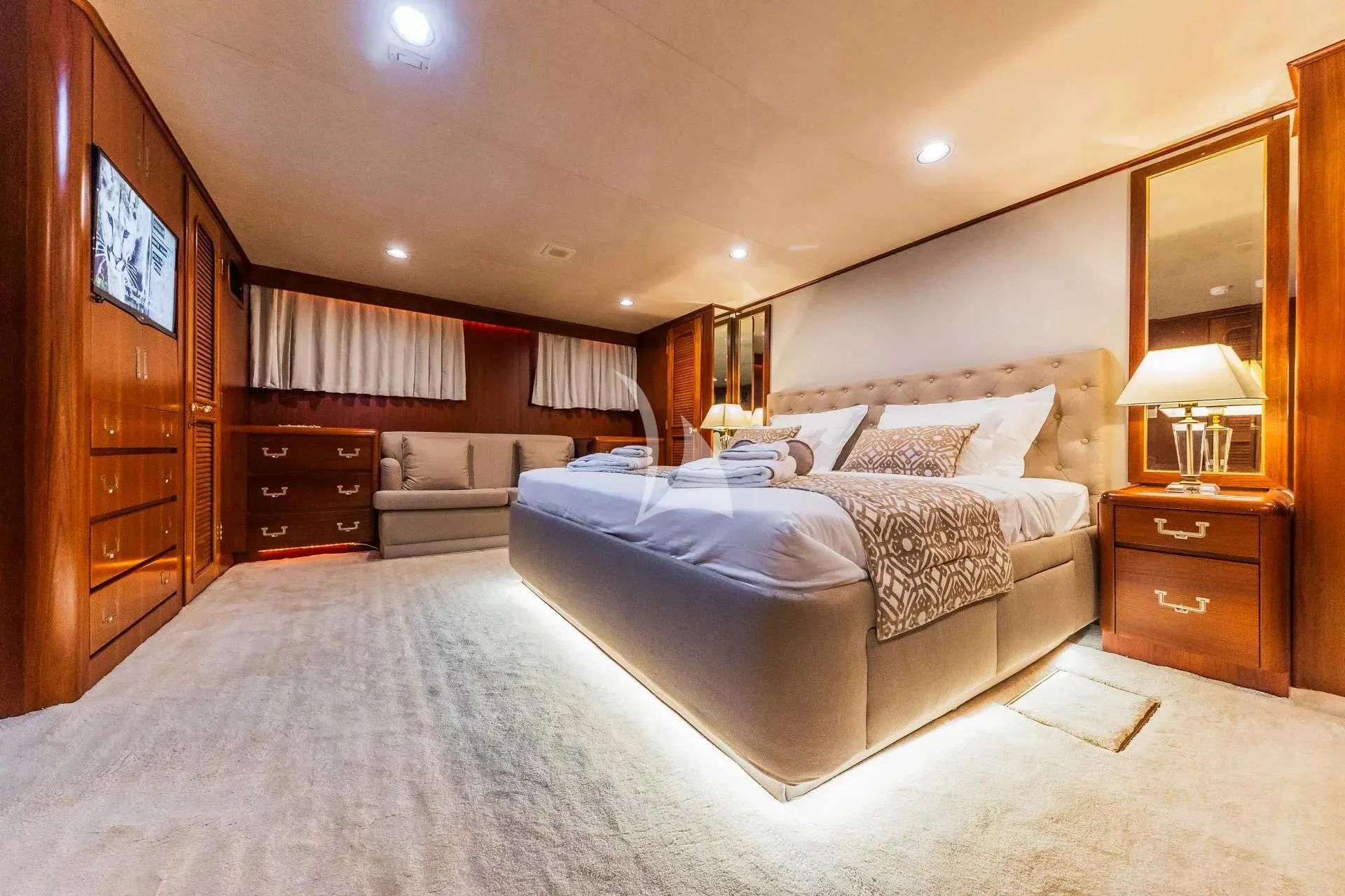 a large bed in a hotel room aboard AURIANE Yacht for Sale