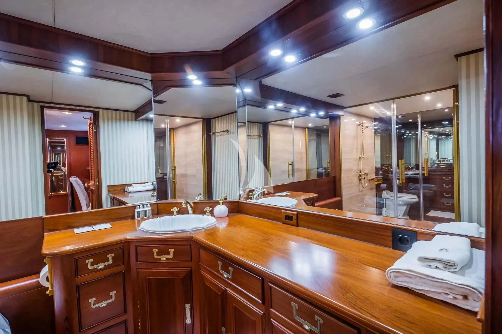 a bathroom with a large mirror aboard AURIANE Yacht for Sale