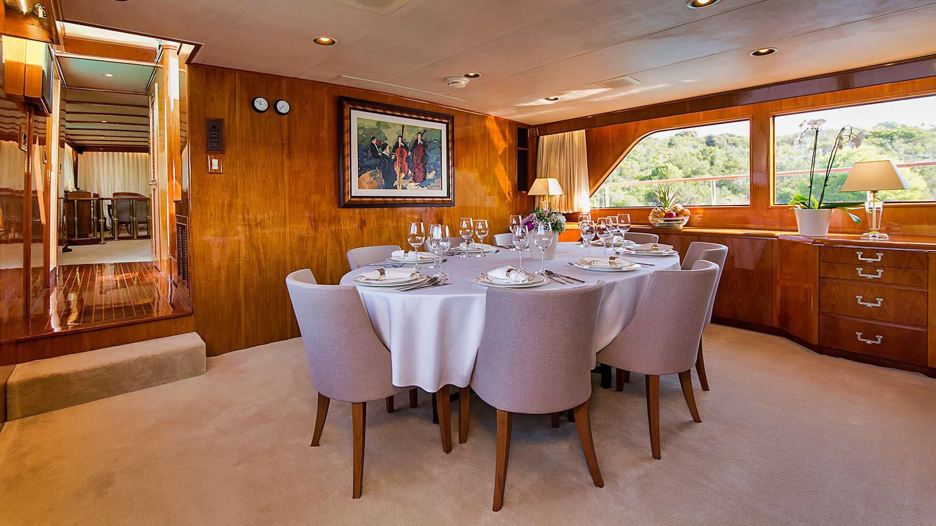 a dining table set for a family dinner aboard AURIANE Yacht for Sale