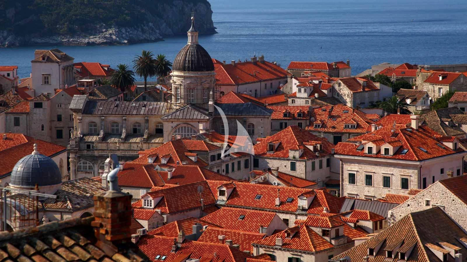 a city with red roofs and a body of water aboard AURIANE Yacht for Sale