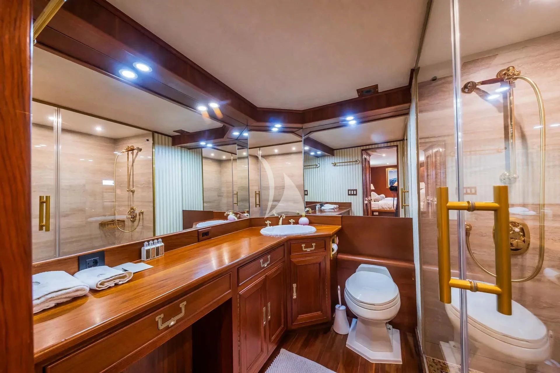 a bathroom with a glass shower aboard AURIANE Yacht for Sale
