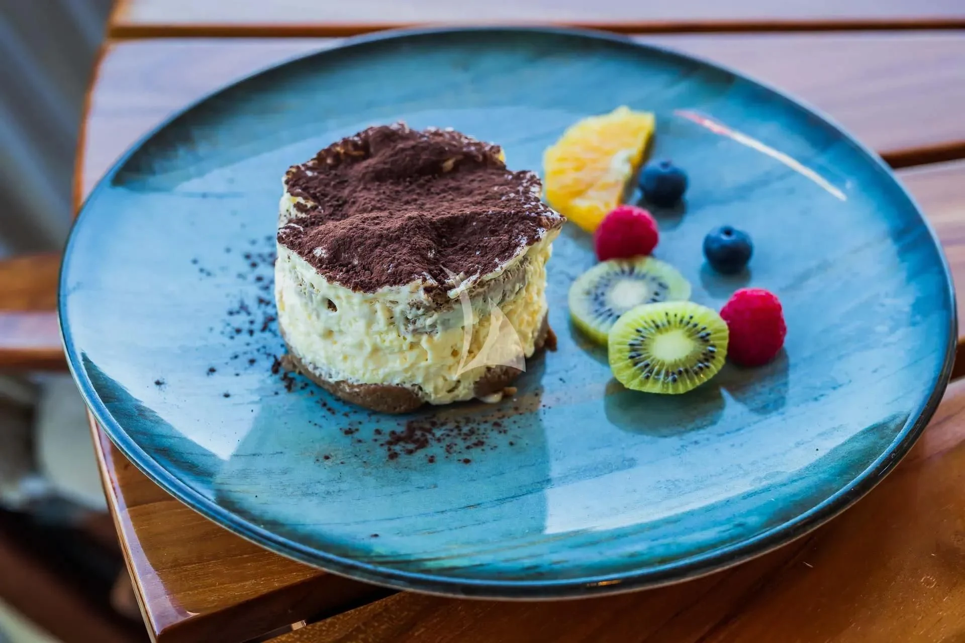a piece of cake on a plate aboard AURIANE Yacht for Sale