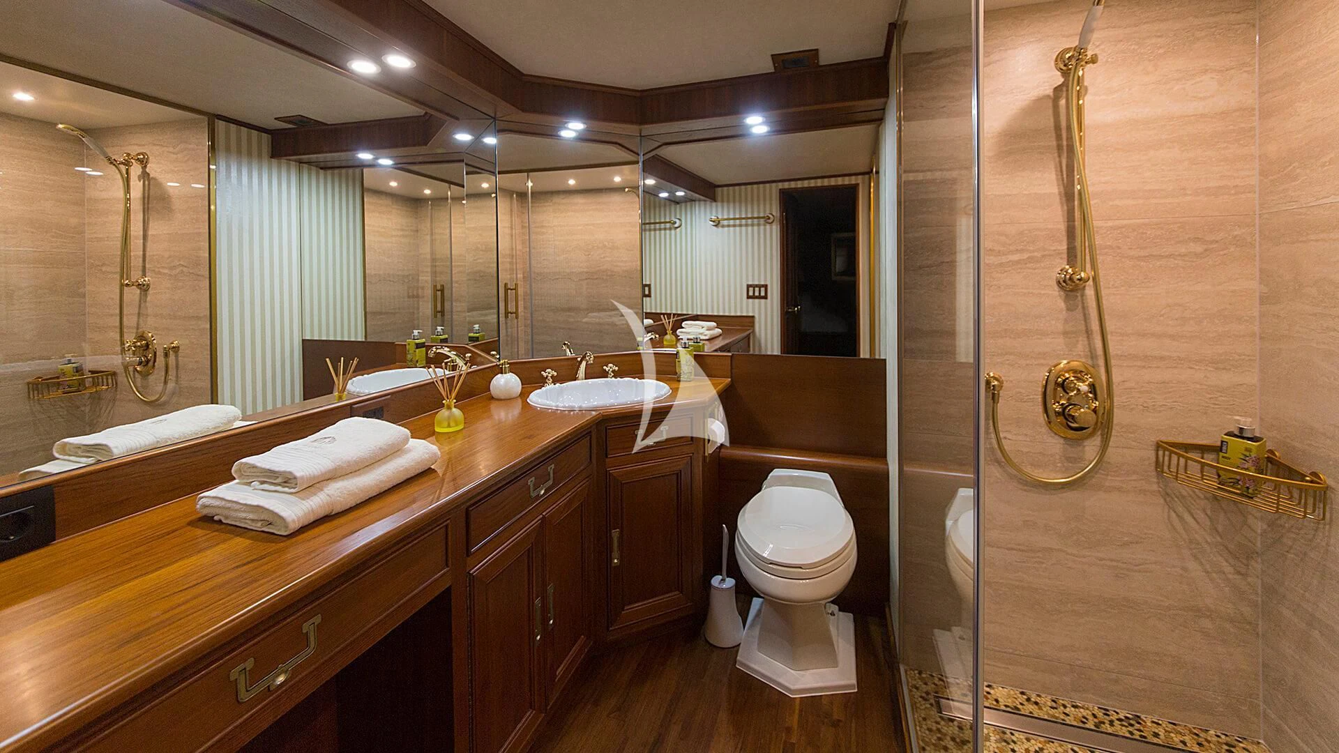 a bathroom with a glass shower aboard AURIANE Yacht for Sale