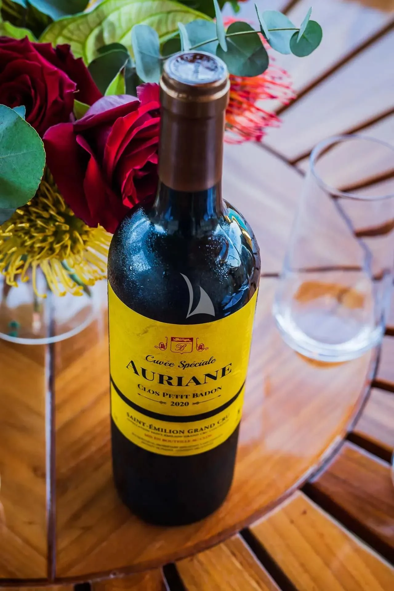 a bottle of wine aboard AURIANE Yacht for Sale