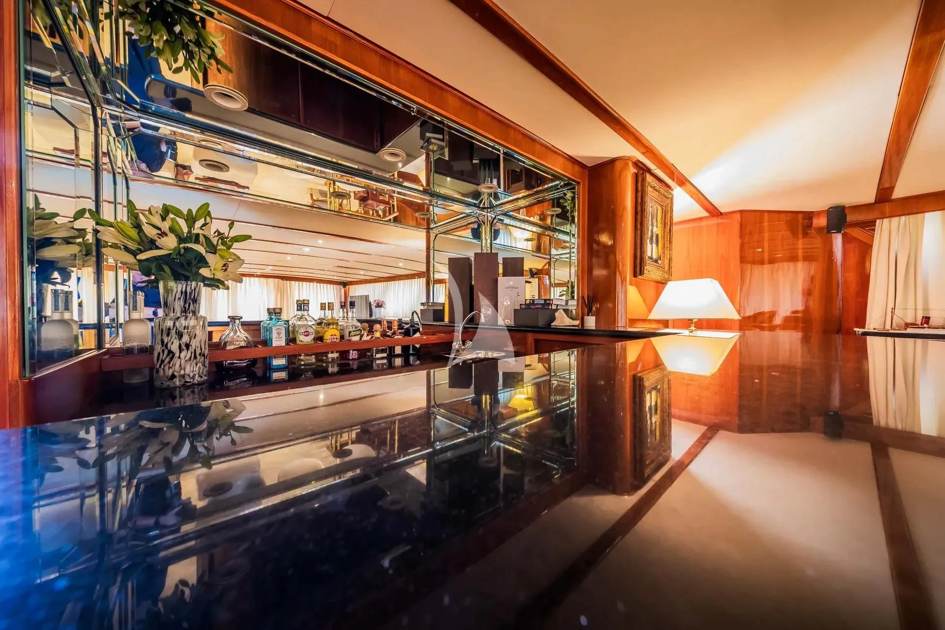 a room with a large glass table aboard AURIANE Yacht for Sale