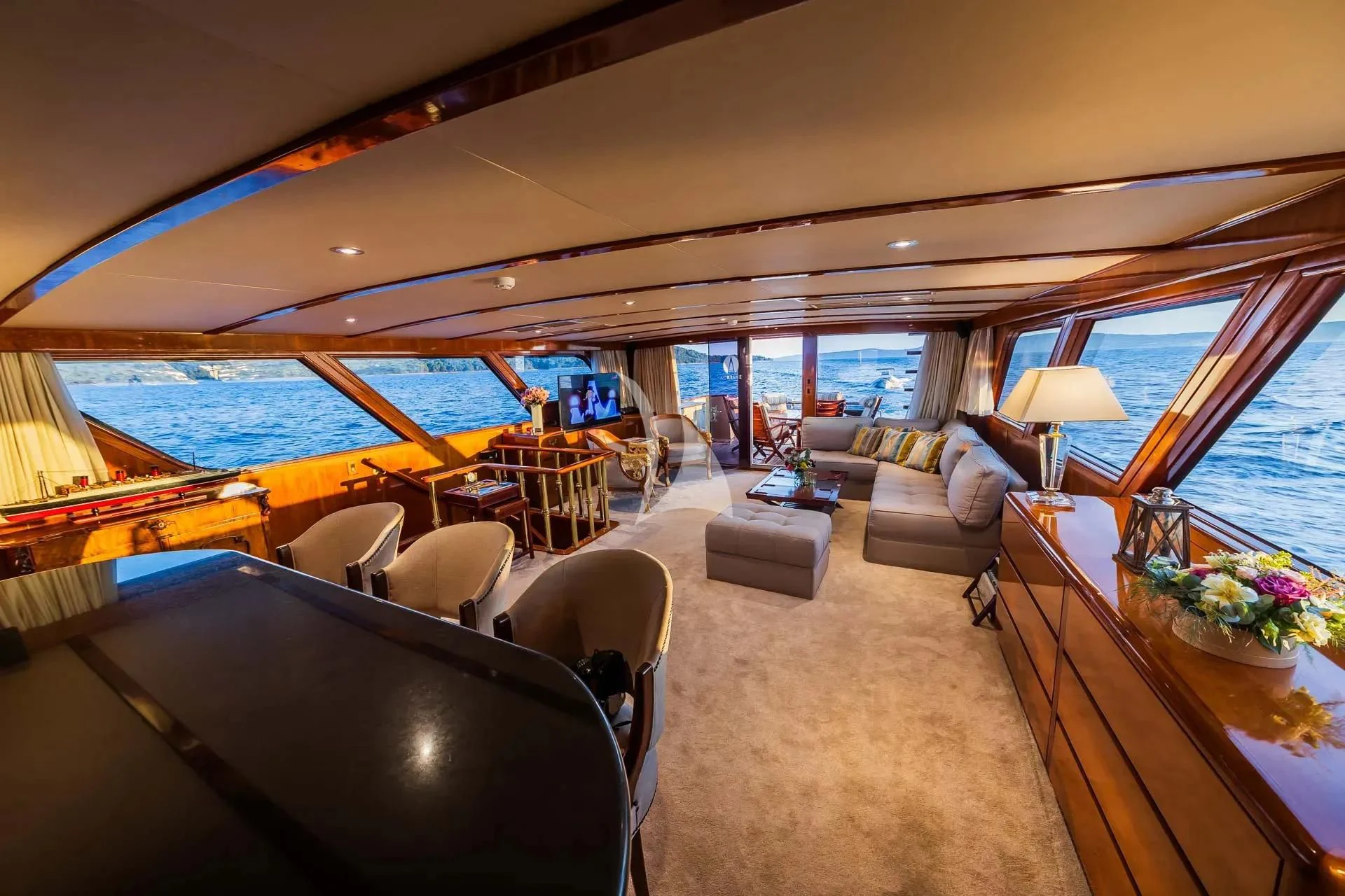 a living room with a large swimming pool aboard AURIANE Yacht for Sale
