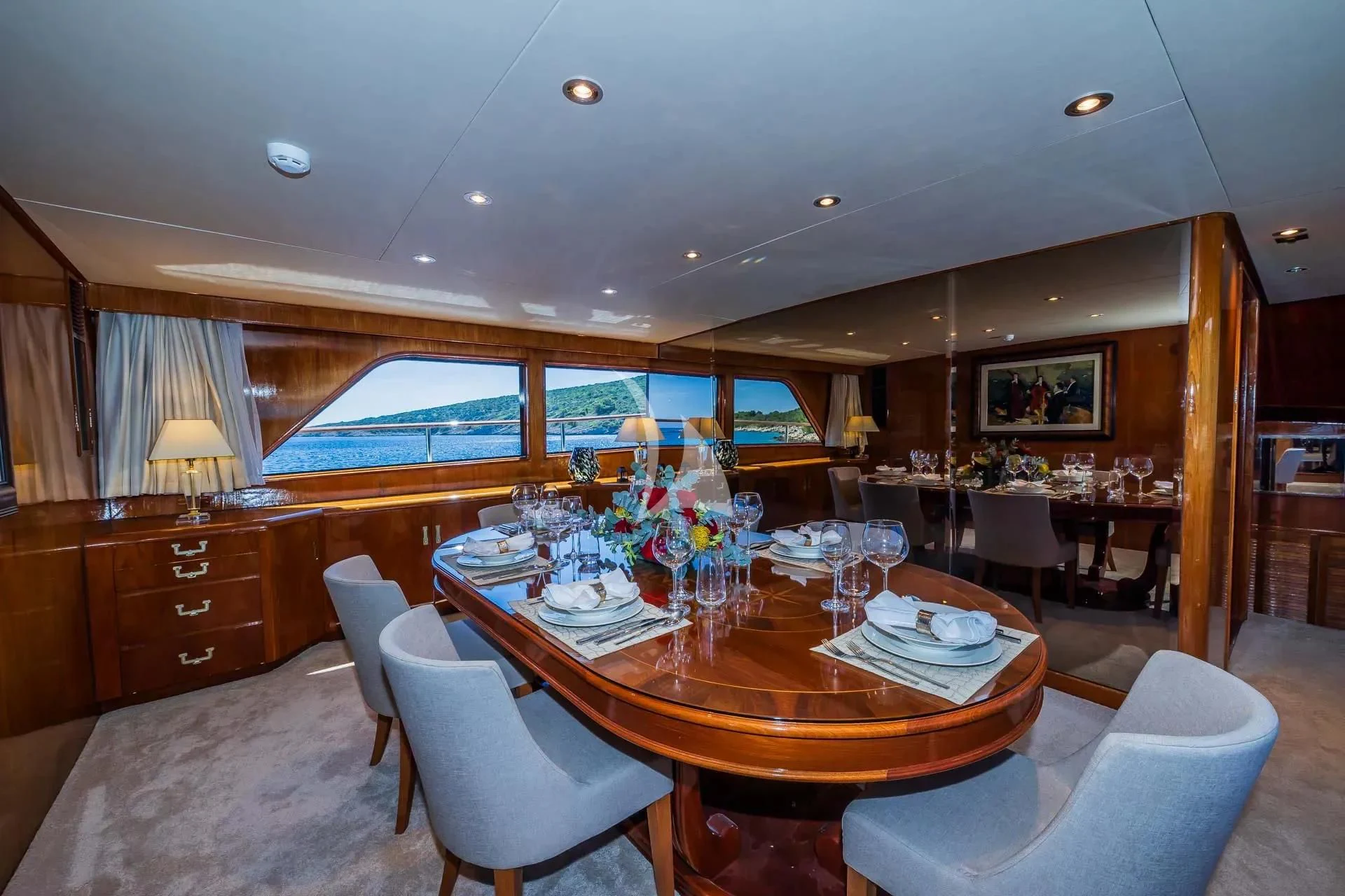 a dining room with a table and chairs aboard AURIANE Yacht for Sale