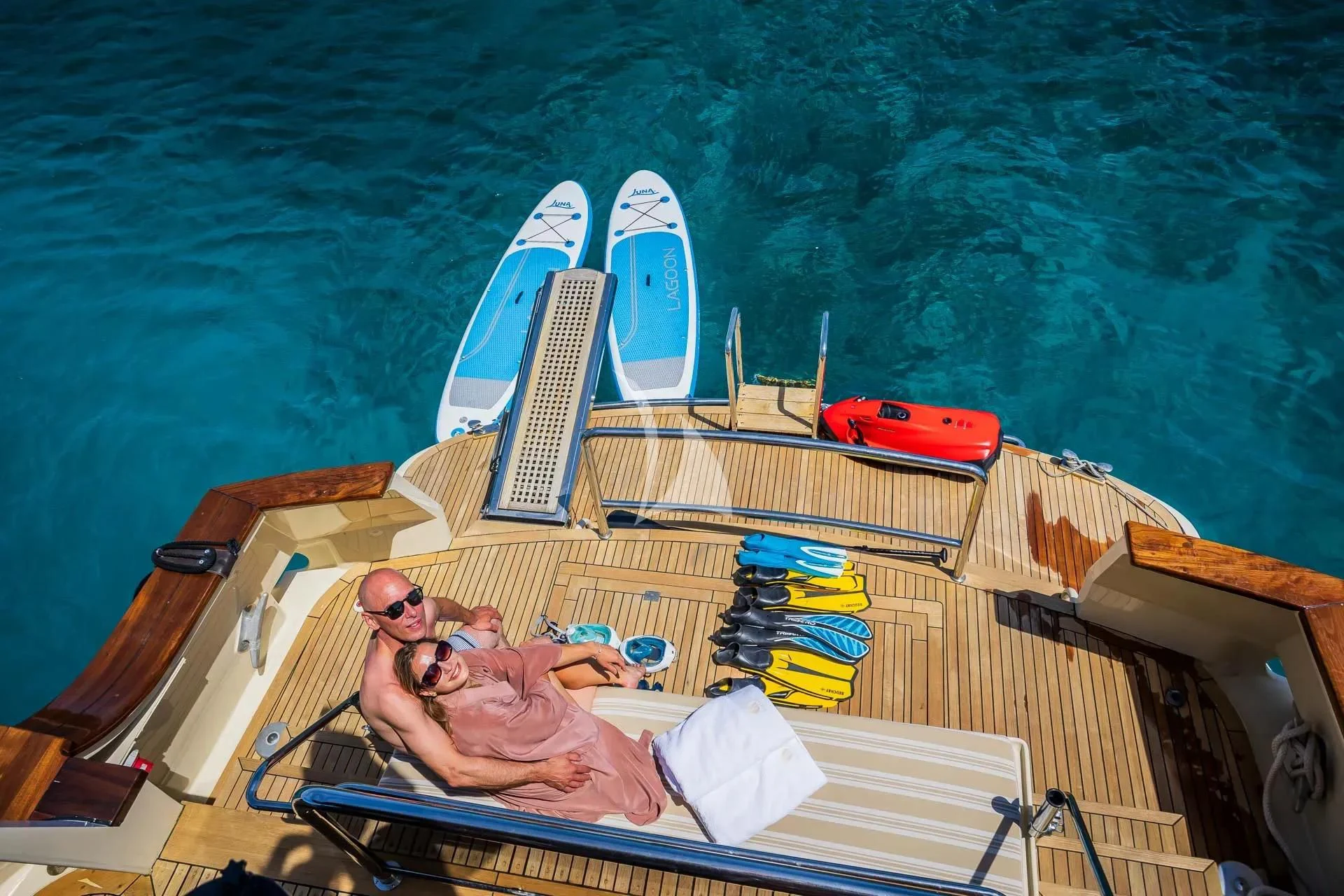 a person lying on a boat aboard AURIANE Yacht for Sale