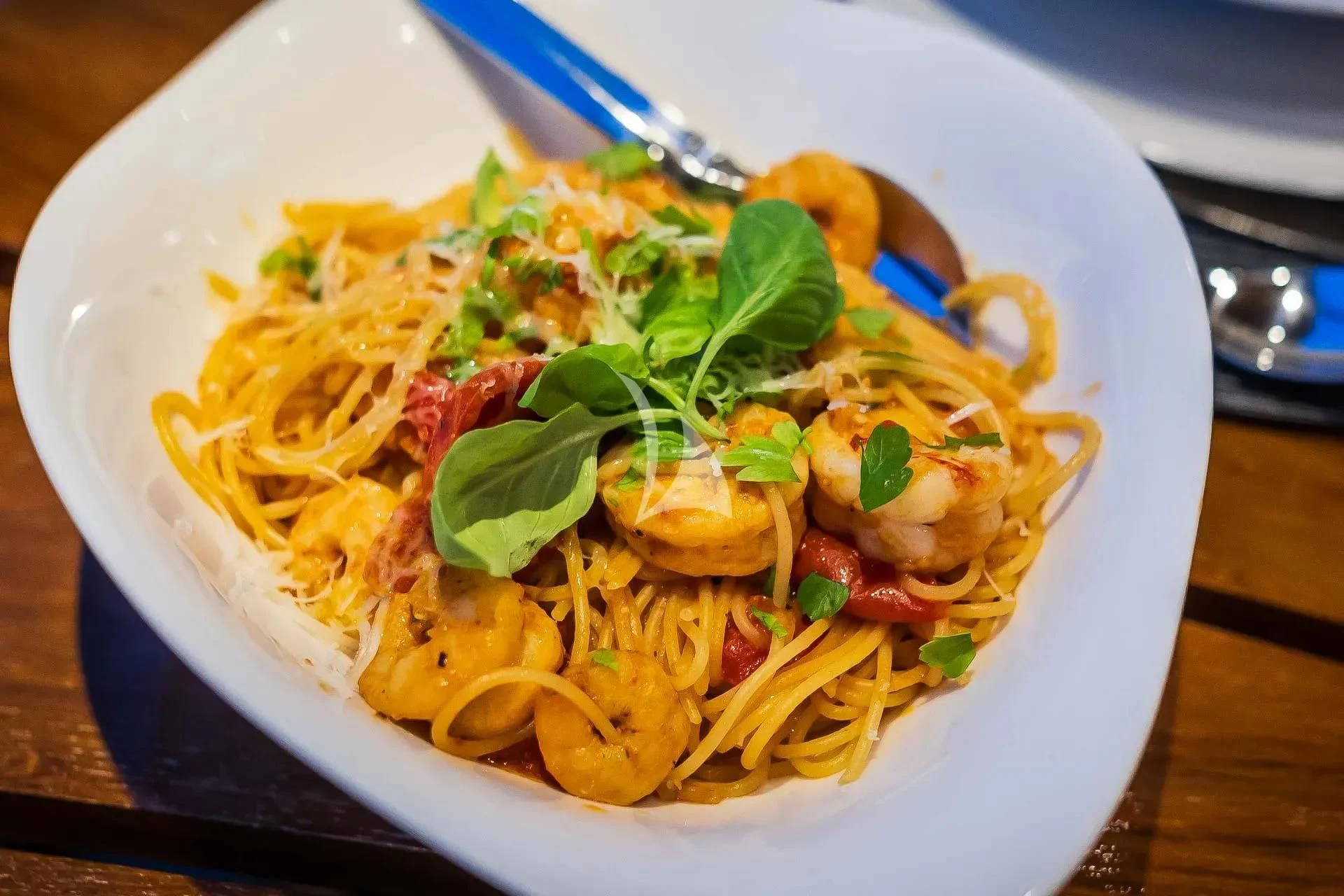 a bowl of noodles with vegetables aboard AURIANE Yacht for Sale