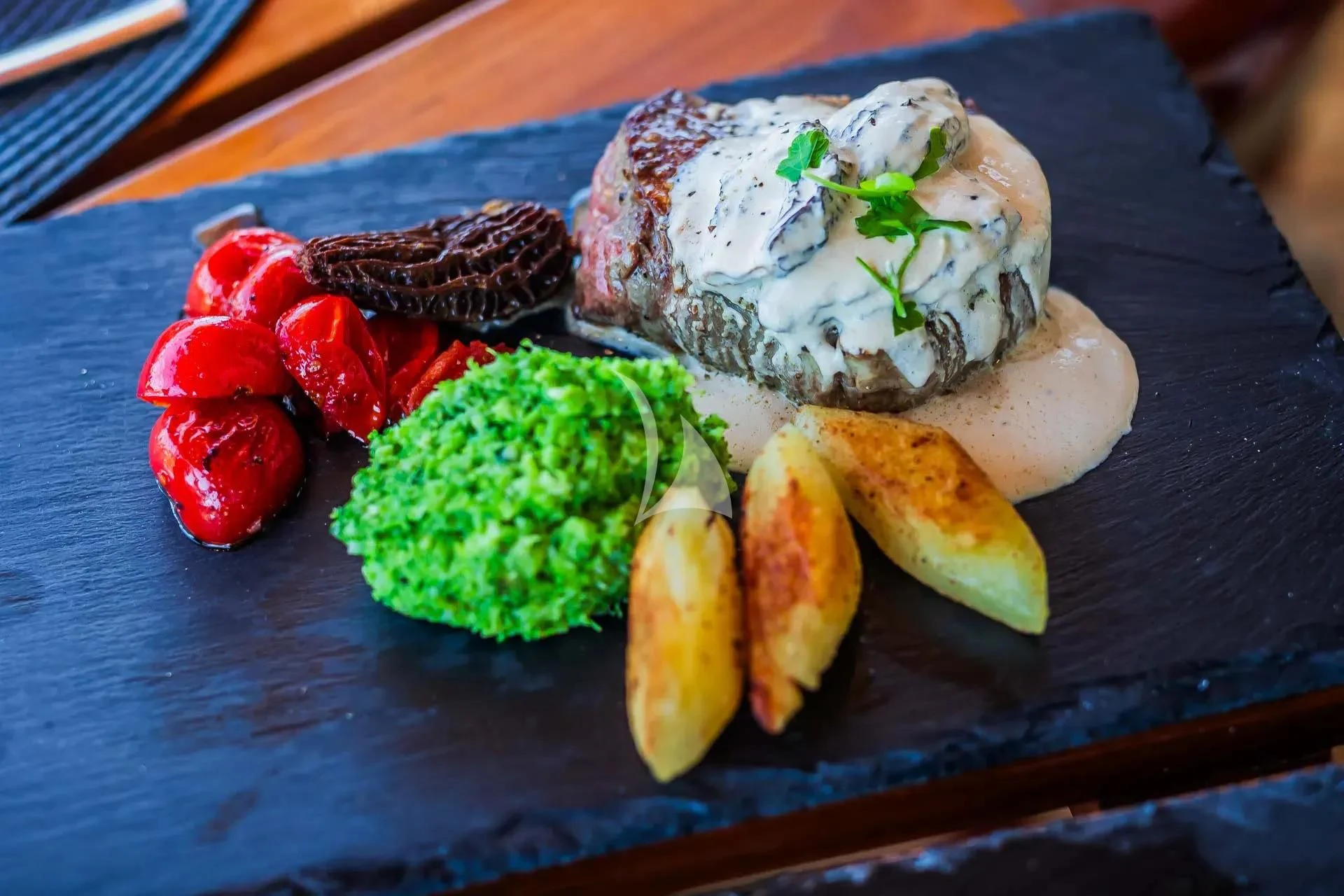 a plate of food aboard AURIANE Yacht for Sale