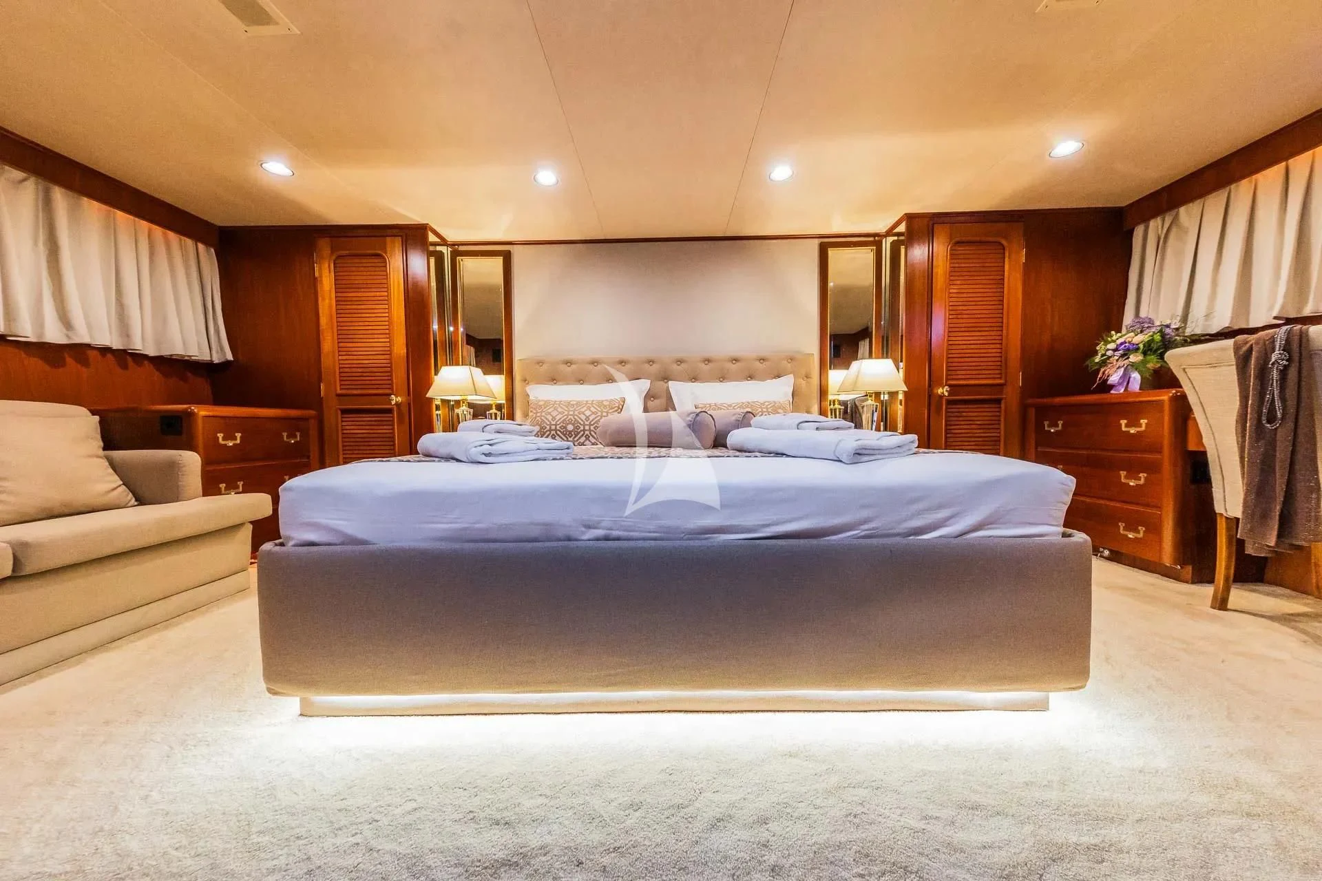a large bedroom with a large bed aboard AURIANE Yacht for Sale